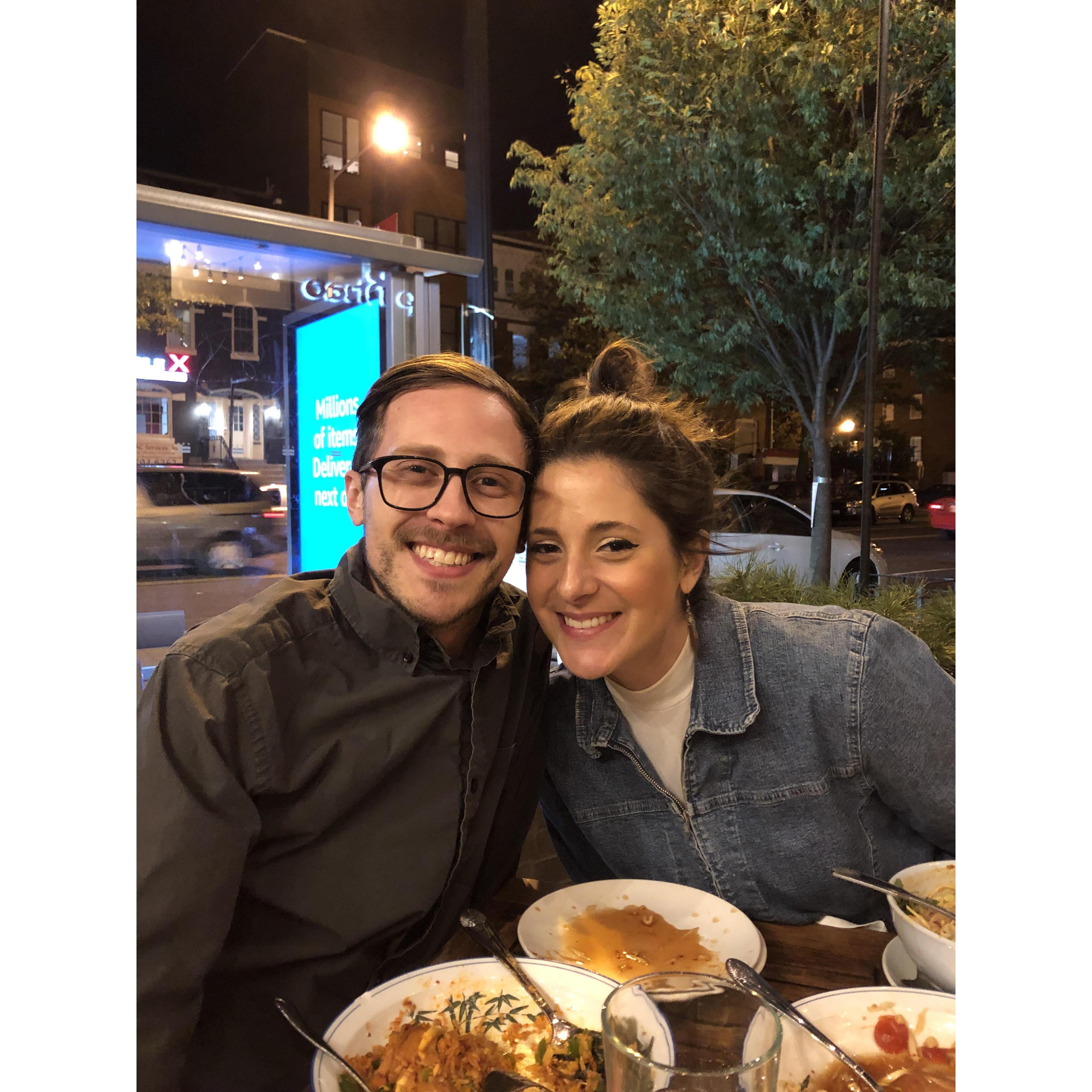 Eating at Thip Khao. You can see the name of the restaurant reflected on the bus stop (in case you didn't believe me when I told you we were at Thip Khao).