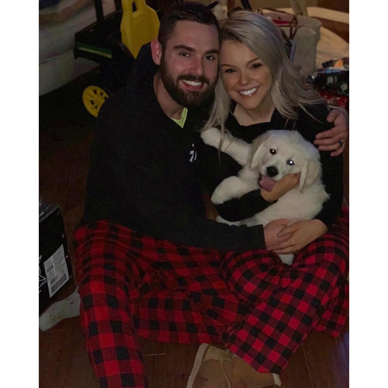 Bryce surprising Ivy on Christmas with their beloved Golden Retriever "Bear"