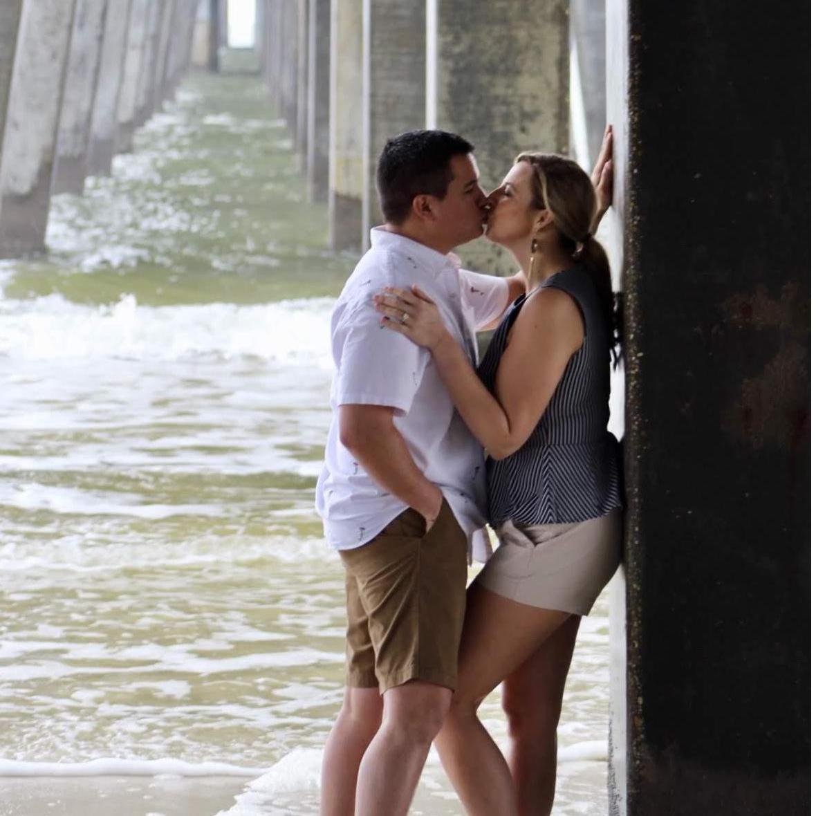 Engagement photos at the pier