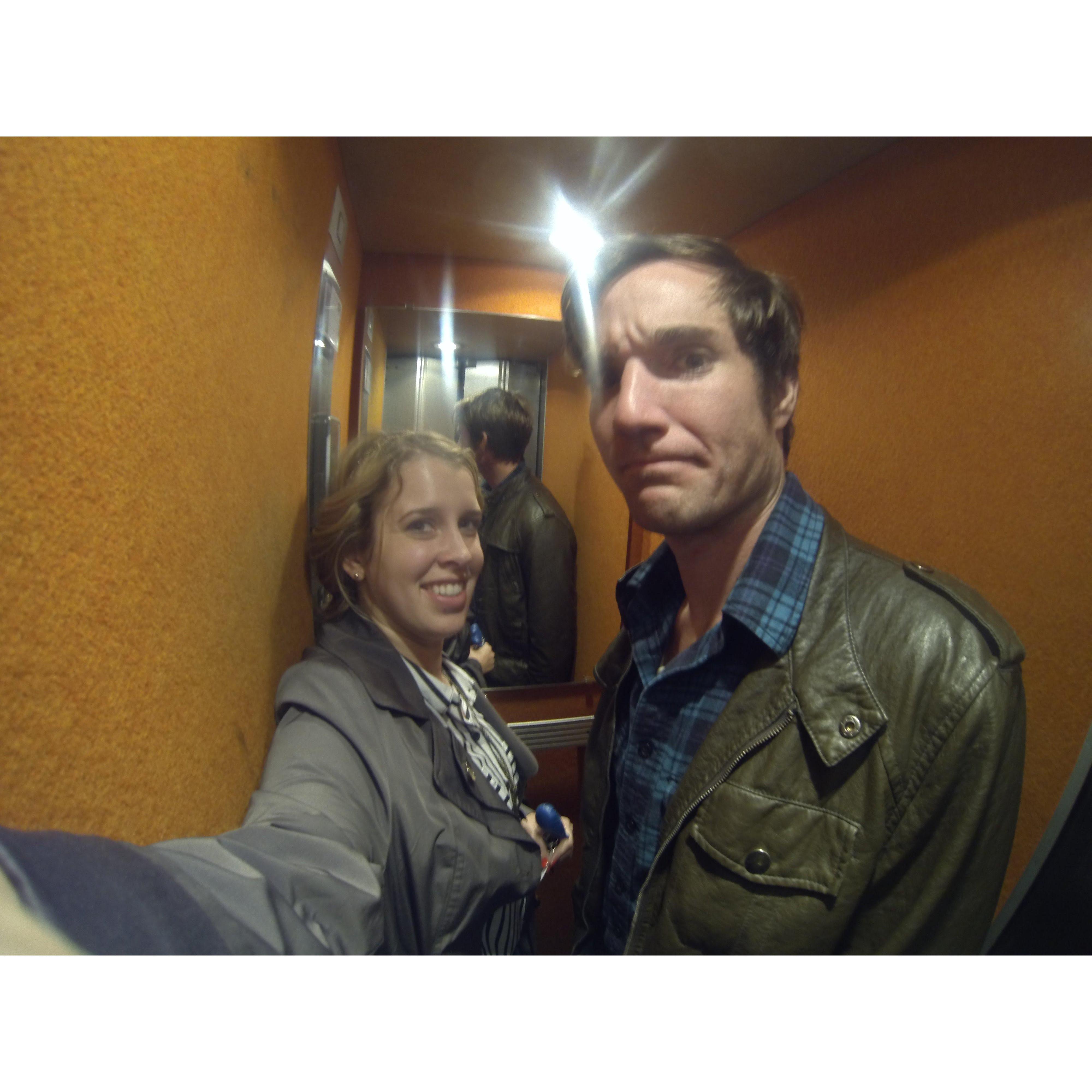 Laughing at the elevator in Paris that was so small we couldn't wear our backpacks