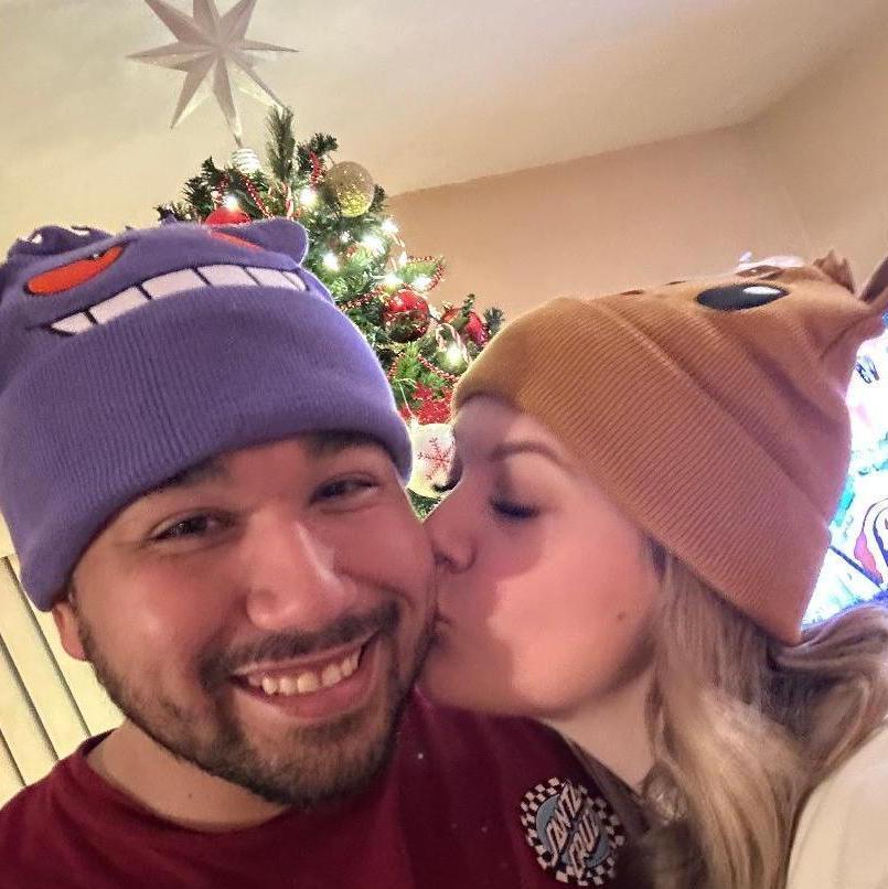 Our first Christmas - where we were gifted hats of our favorite Pokemon from Logan's parents!