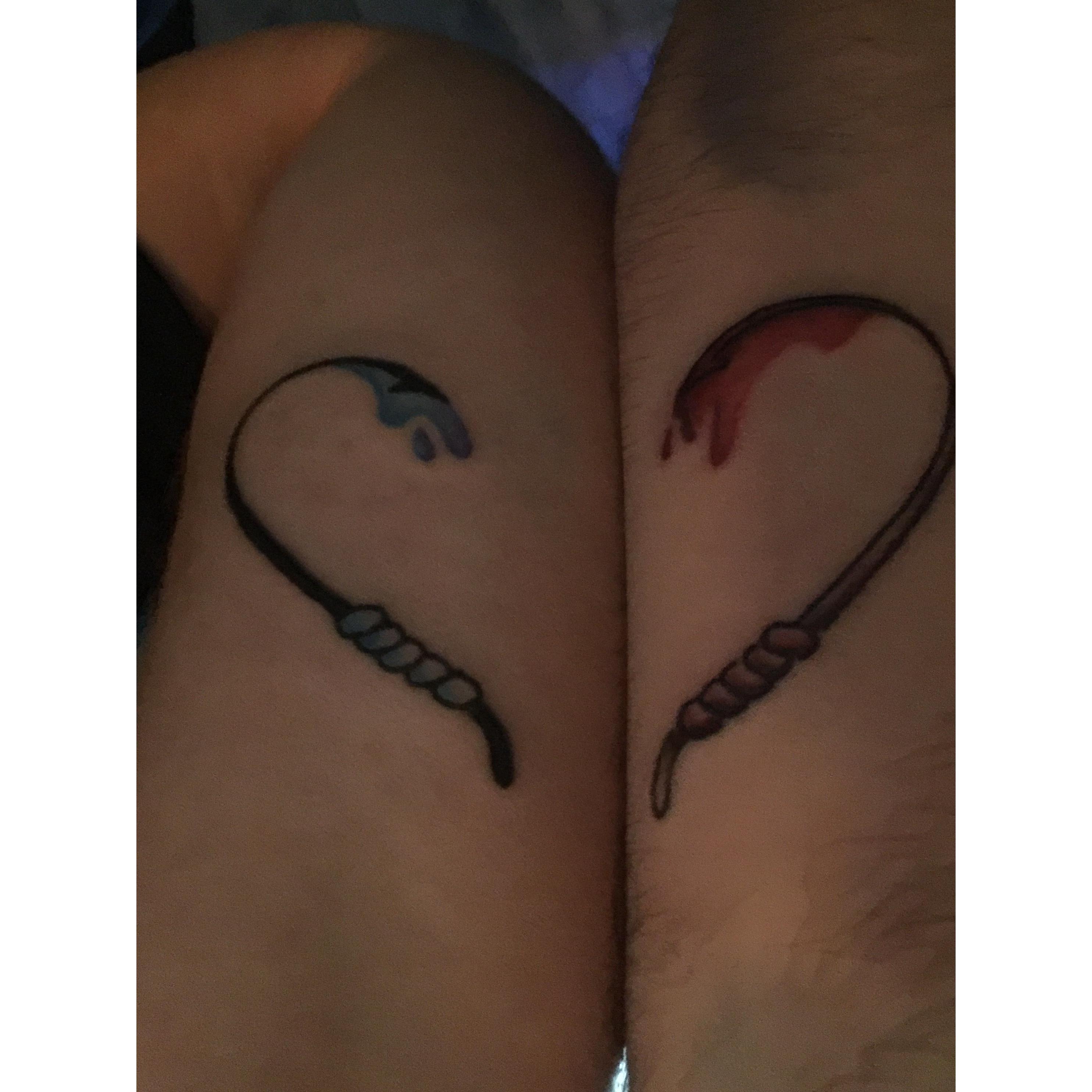 Matching fishing hook tattoos that make a heart when we hold hands, January 2019