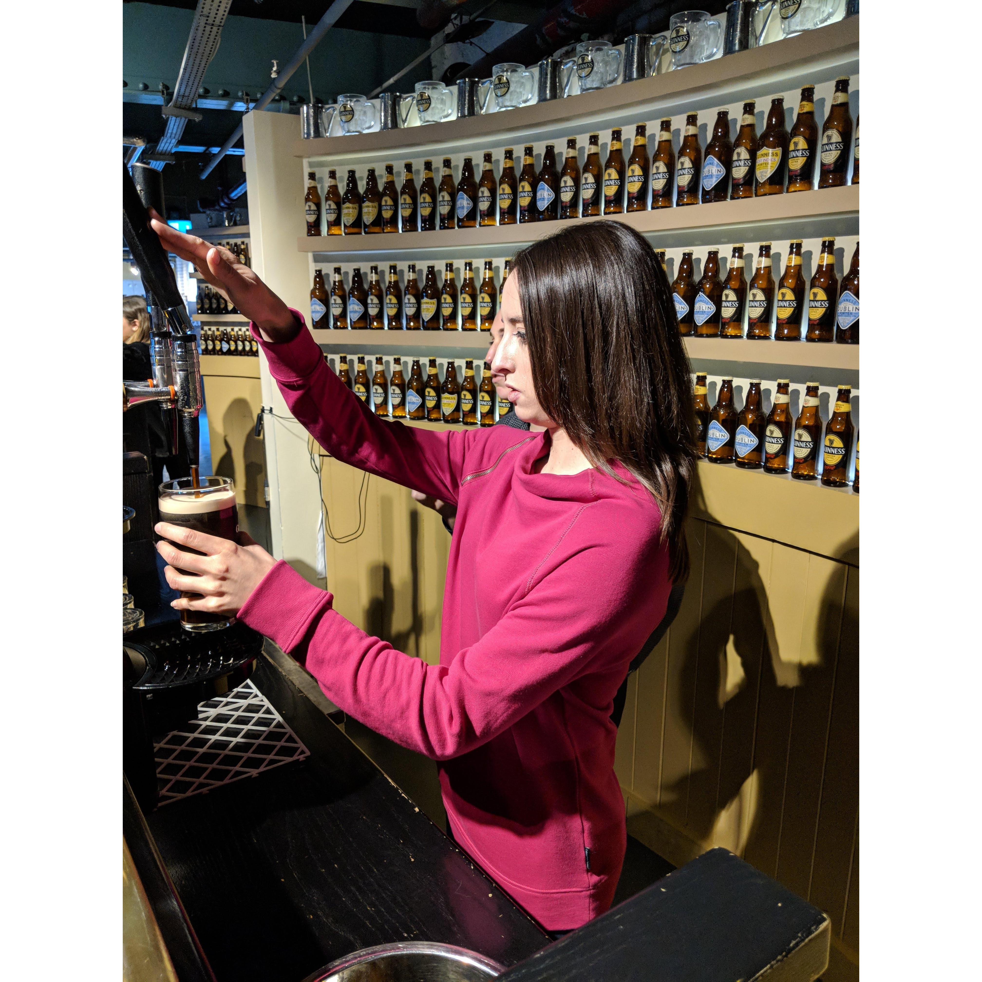 Pouring a pint of Guinness at the source.