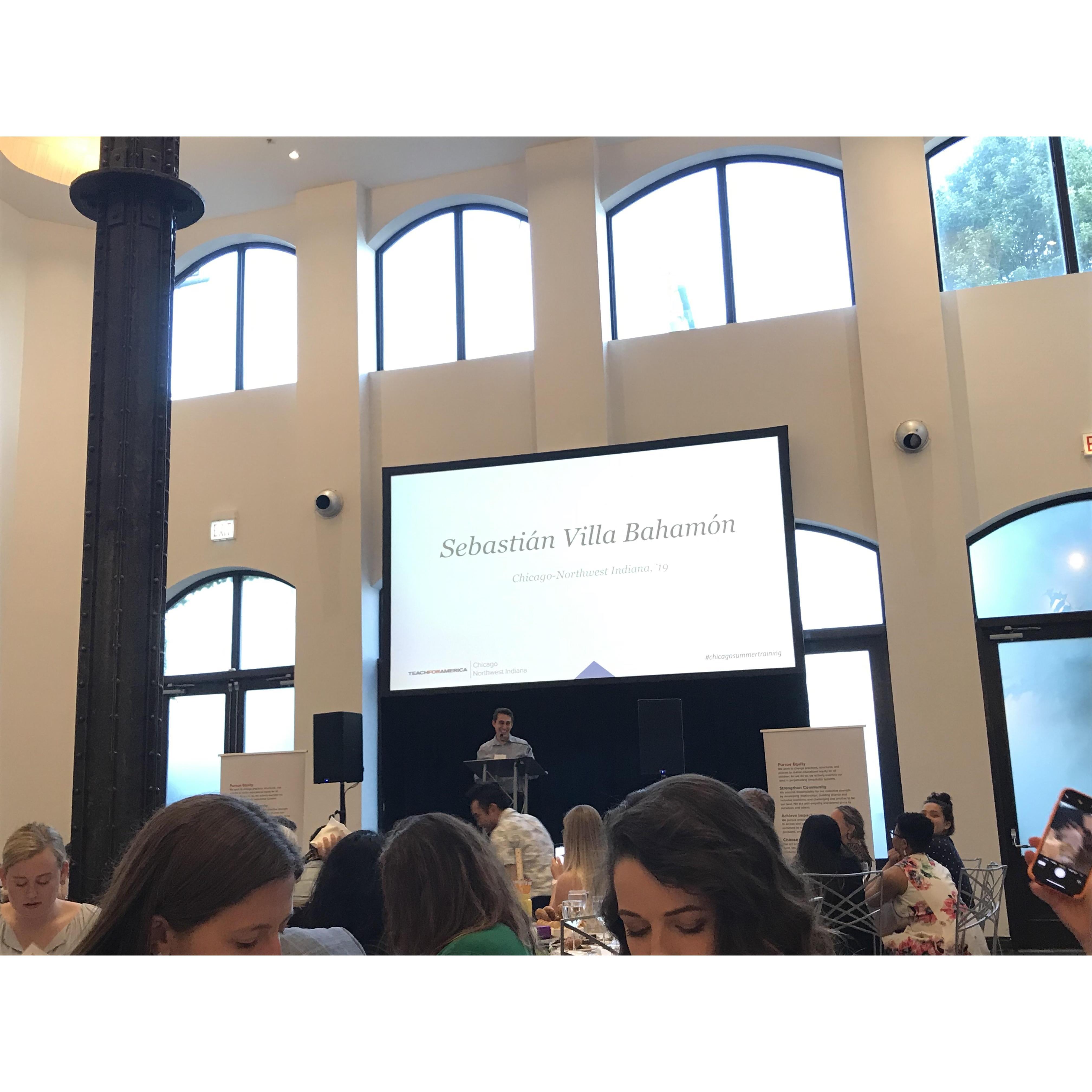 Sebastián giving the keynote speech at a TFA event. July 2019