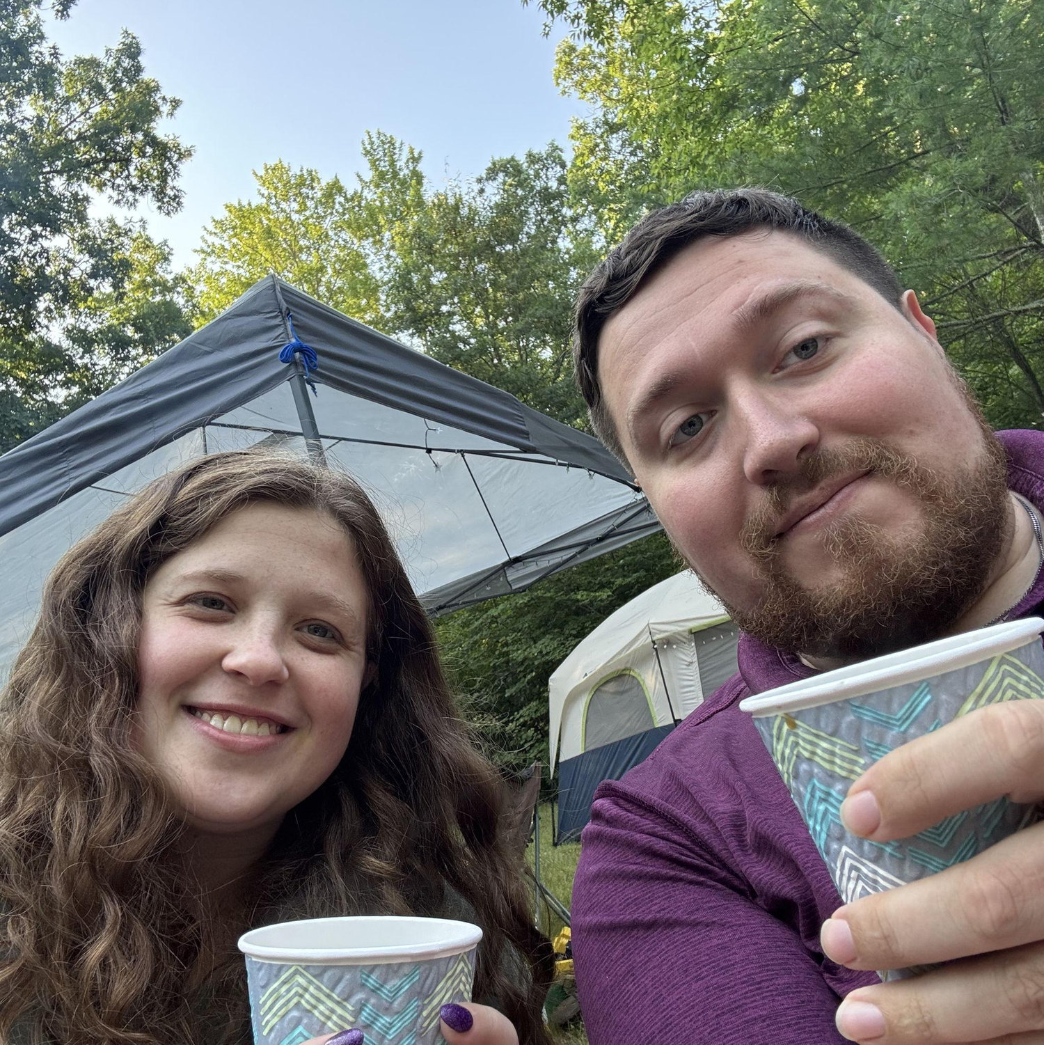 This was the morning of the day of Benn’s proposal before he ever ask. We are enjoying a warm cup of coffee. Before getting ready to head on the pine river in Manistee Forest with all our friends.