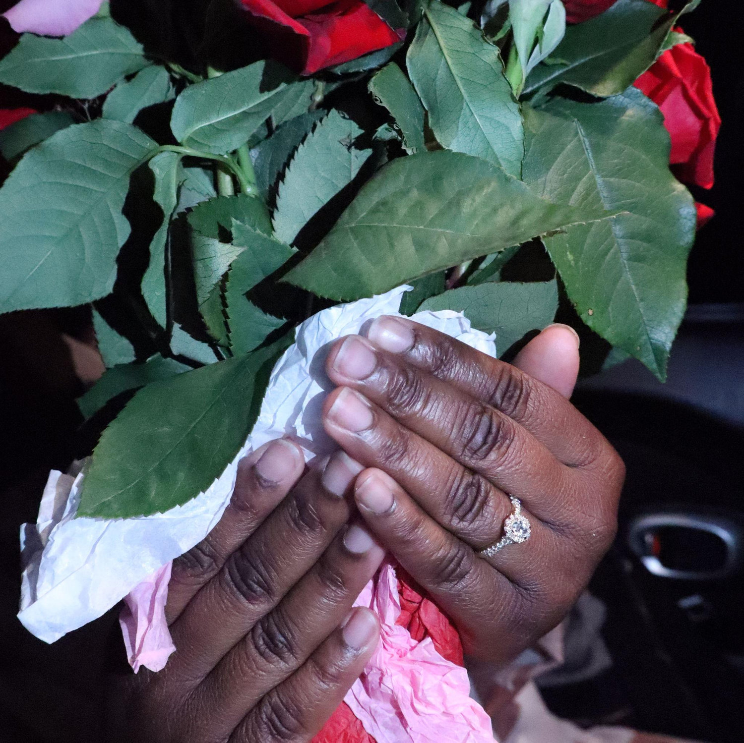 Engagement ring and flower bouquet