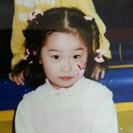 Young Haejin in bows with face painted