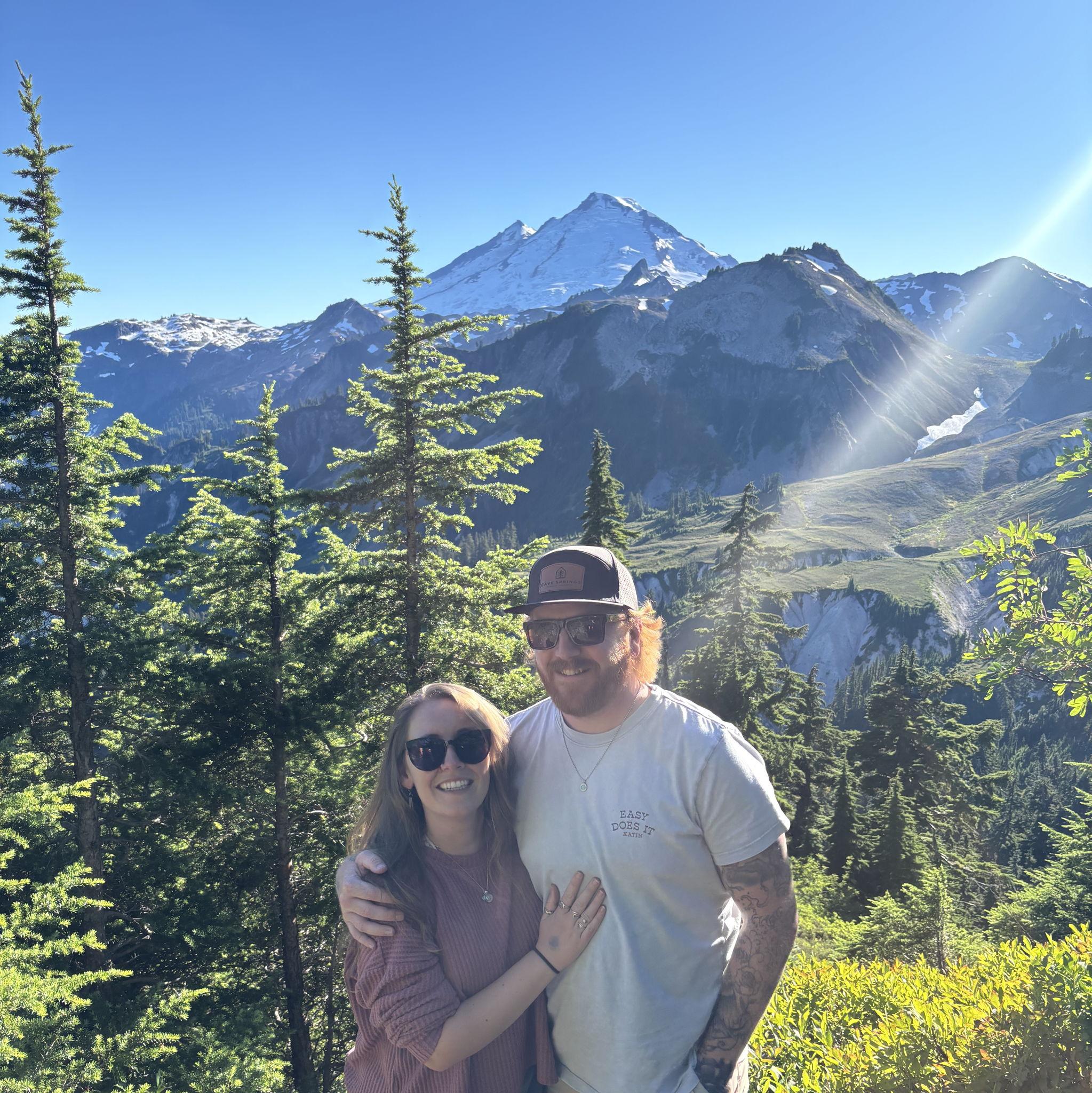 First time throwing snowballs at each other and swimming in glacial waters at Artist's Peak in Washington