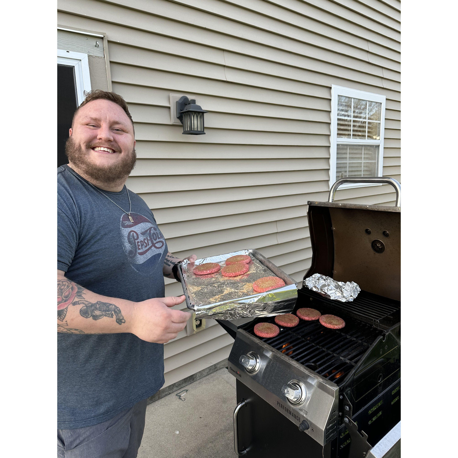 Austin doing one of his favorite things--grilling!