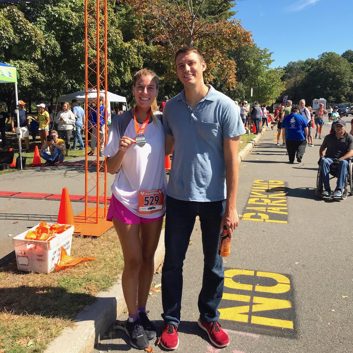 Jay is, and will forever be, Emma's biggest cheerleader. He's always there to greet her at the finish line with a smile (and a bagel).