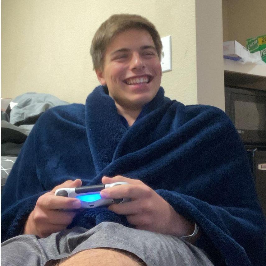 The big smile Kylee fell in love with. This was a common view on facetime for Kylee... multitasking his videogame and his girl.
