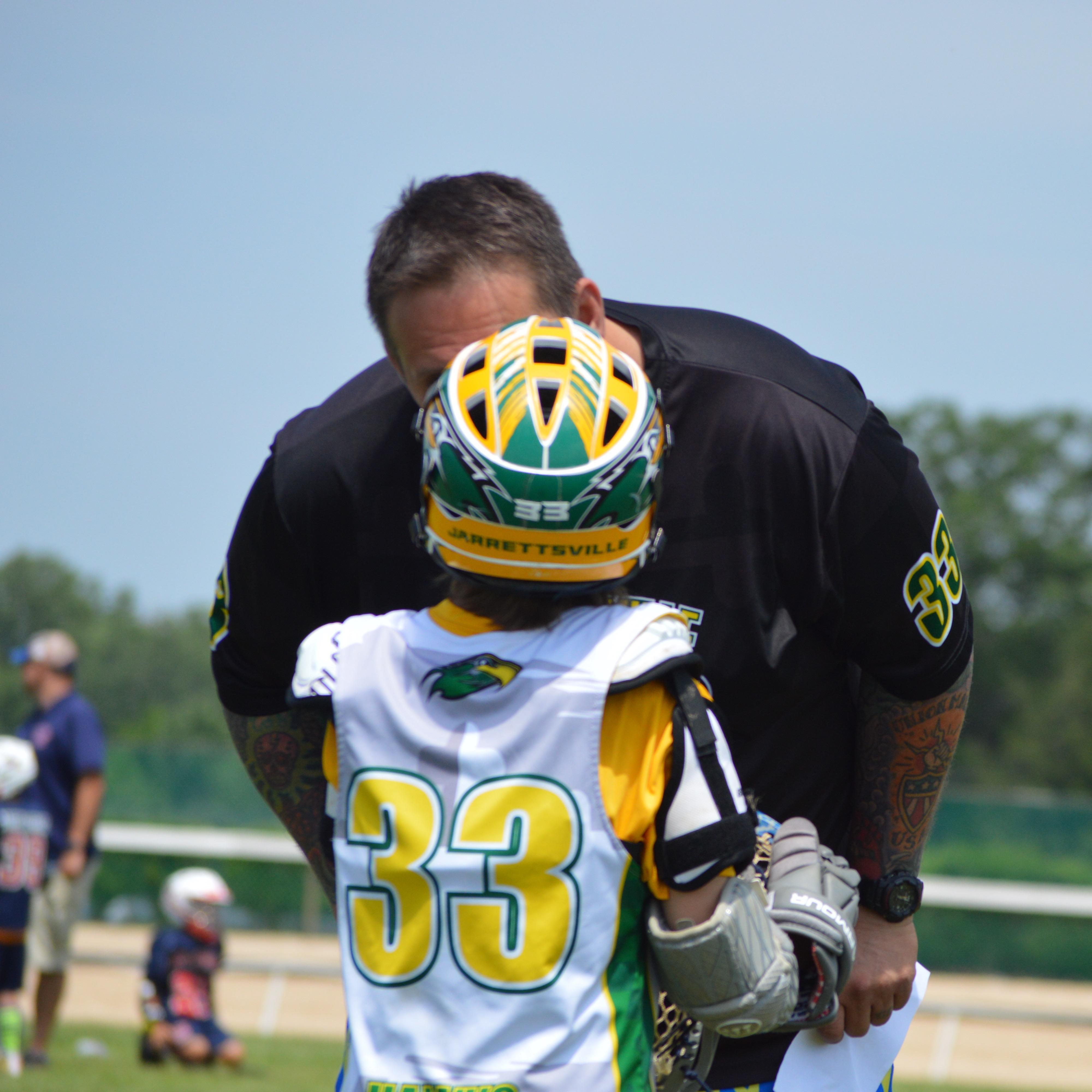 Last game in our first Lacrosse Tournament! Nate is # 33!