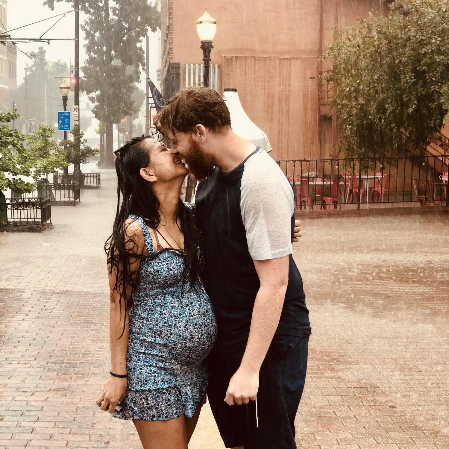 When you get caught in a downpour, kiss in the rain!