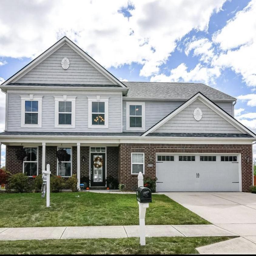 We bought a new house! Evan's books will finally all be unpacked!