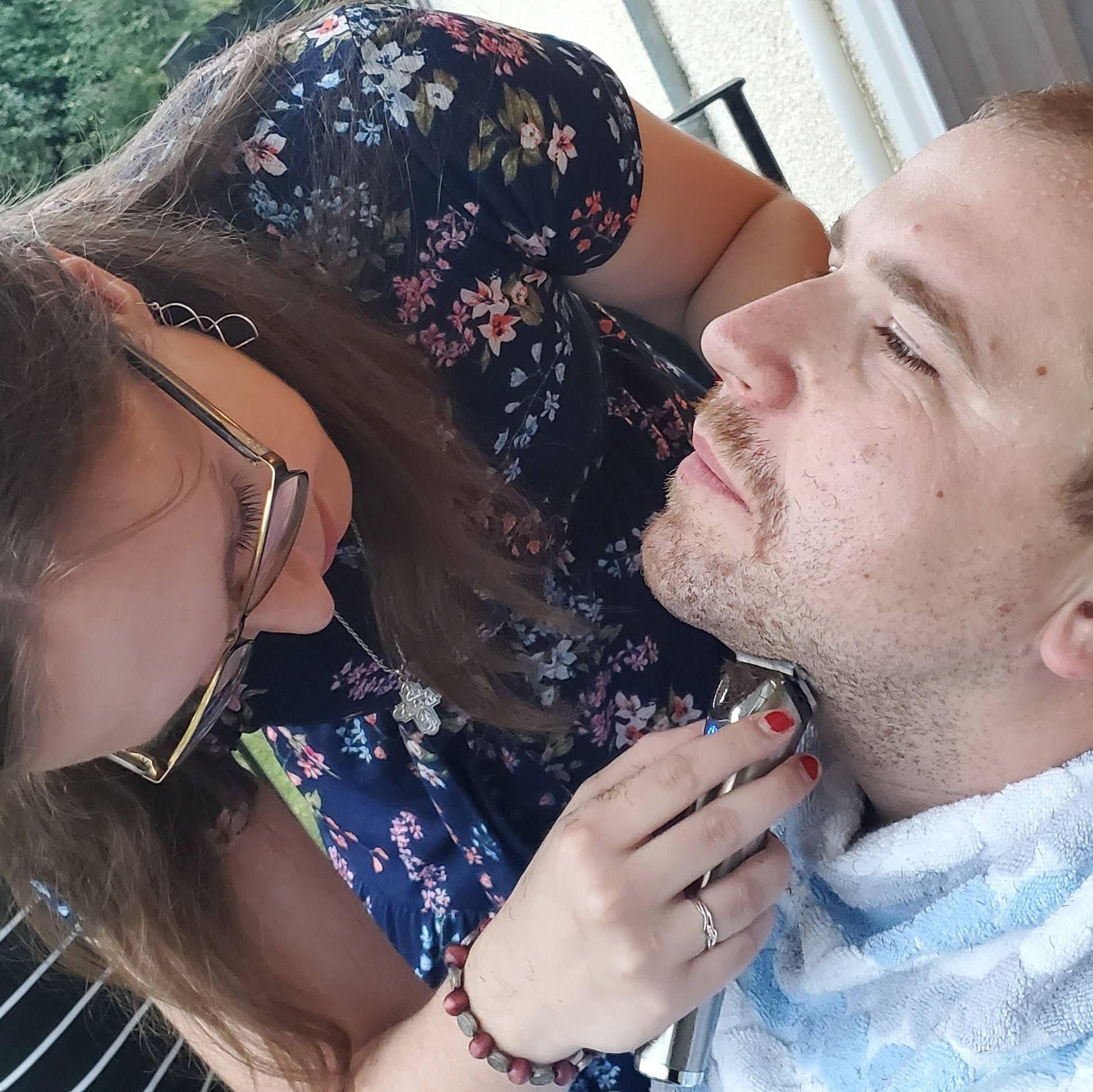Sarah's first time shaving Adam's goatee...steady!
