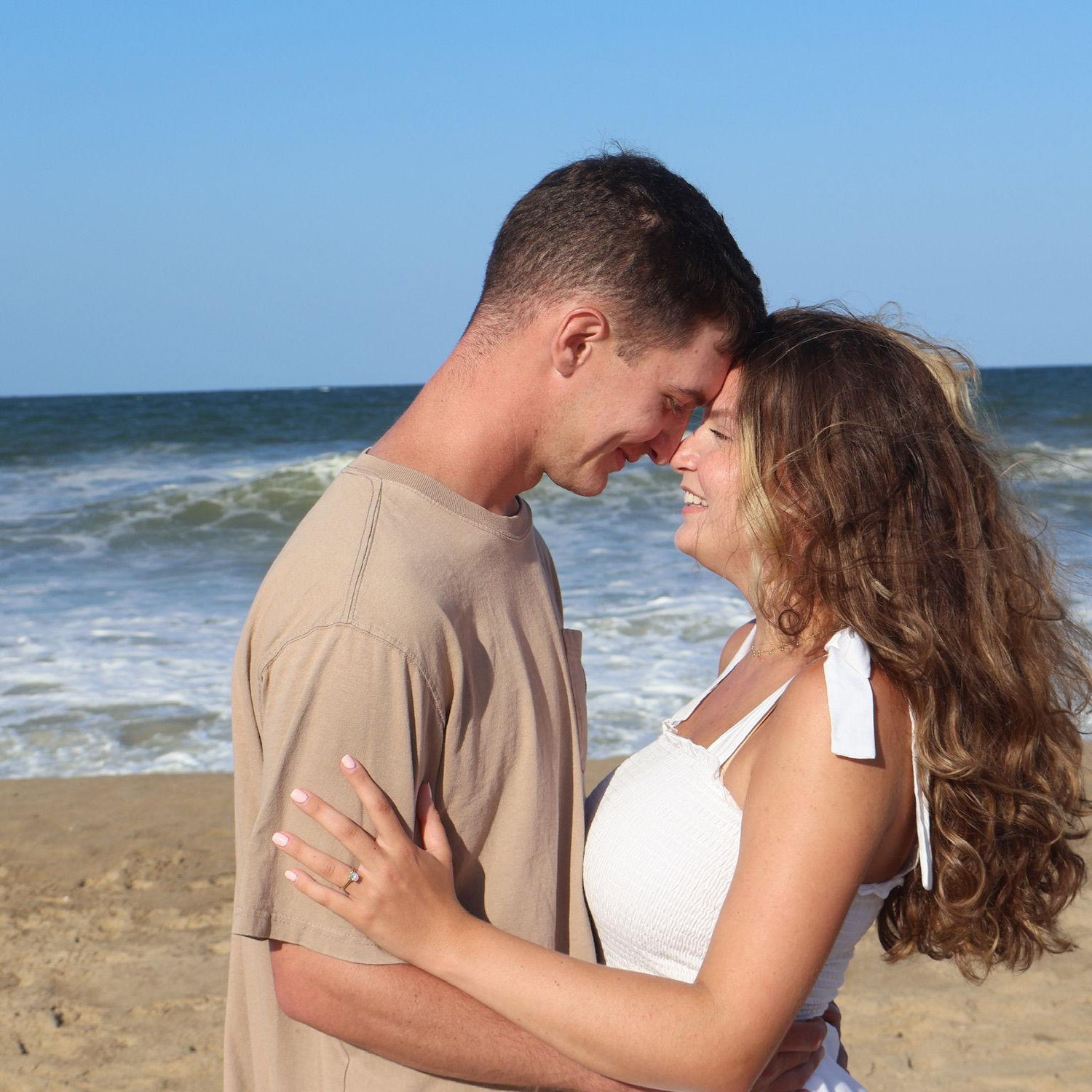One of many engagement photos on our favorite beach spot.