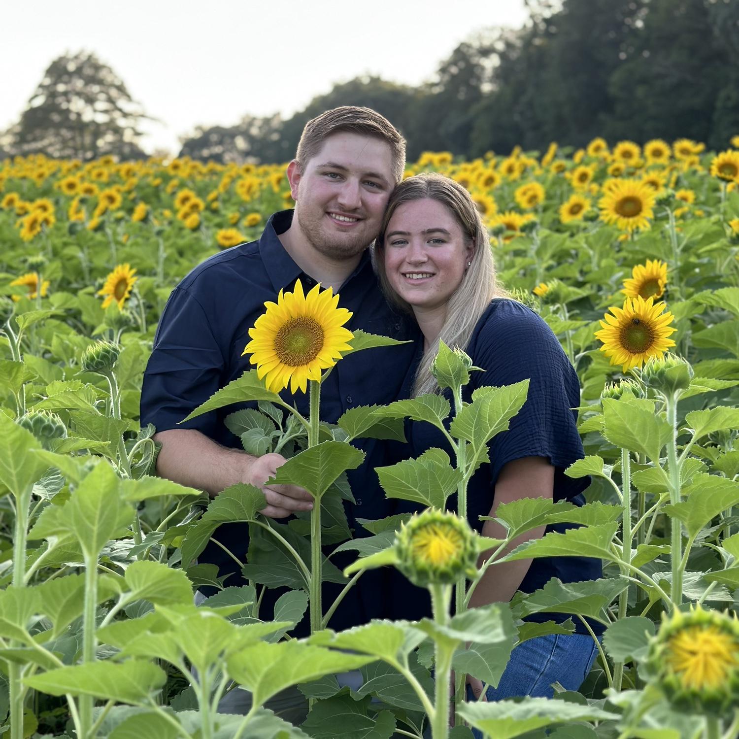 In Lee, NH Jeremy and Hannah love picking Hannah’s favorite flowers… Sunflowers!