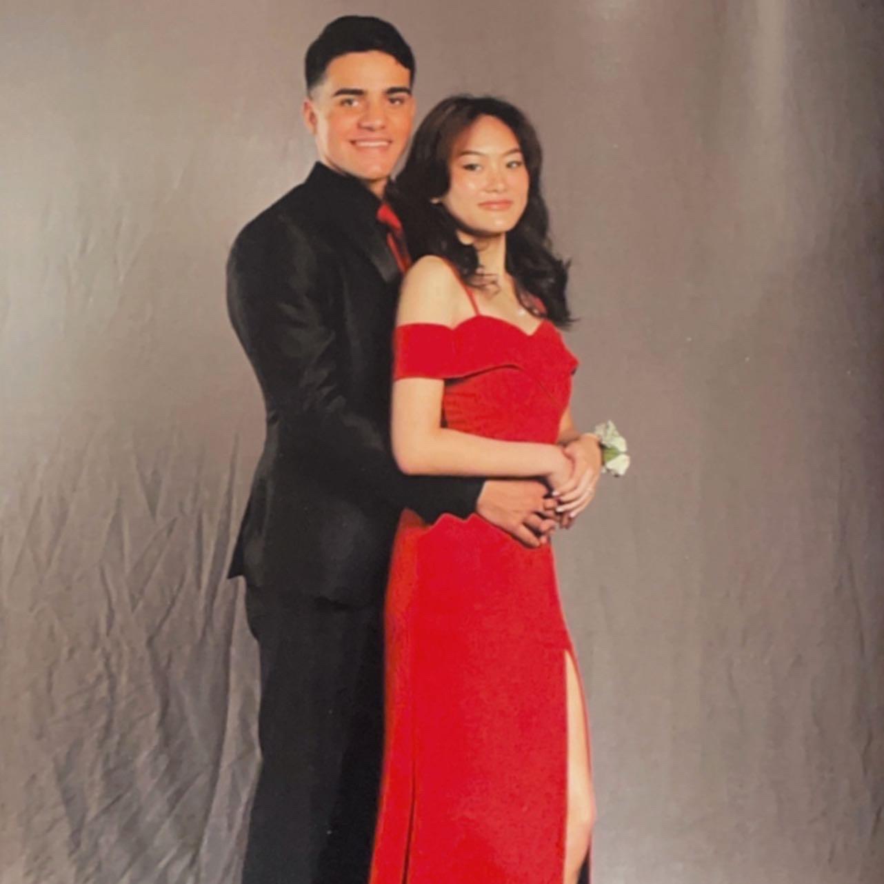 5/14/22: Professional prom photo except why didn’t they iron the backdrop??