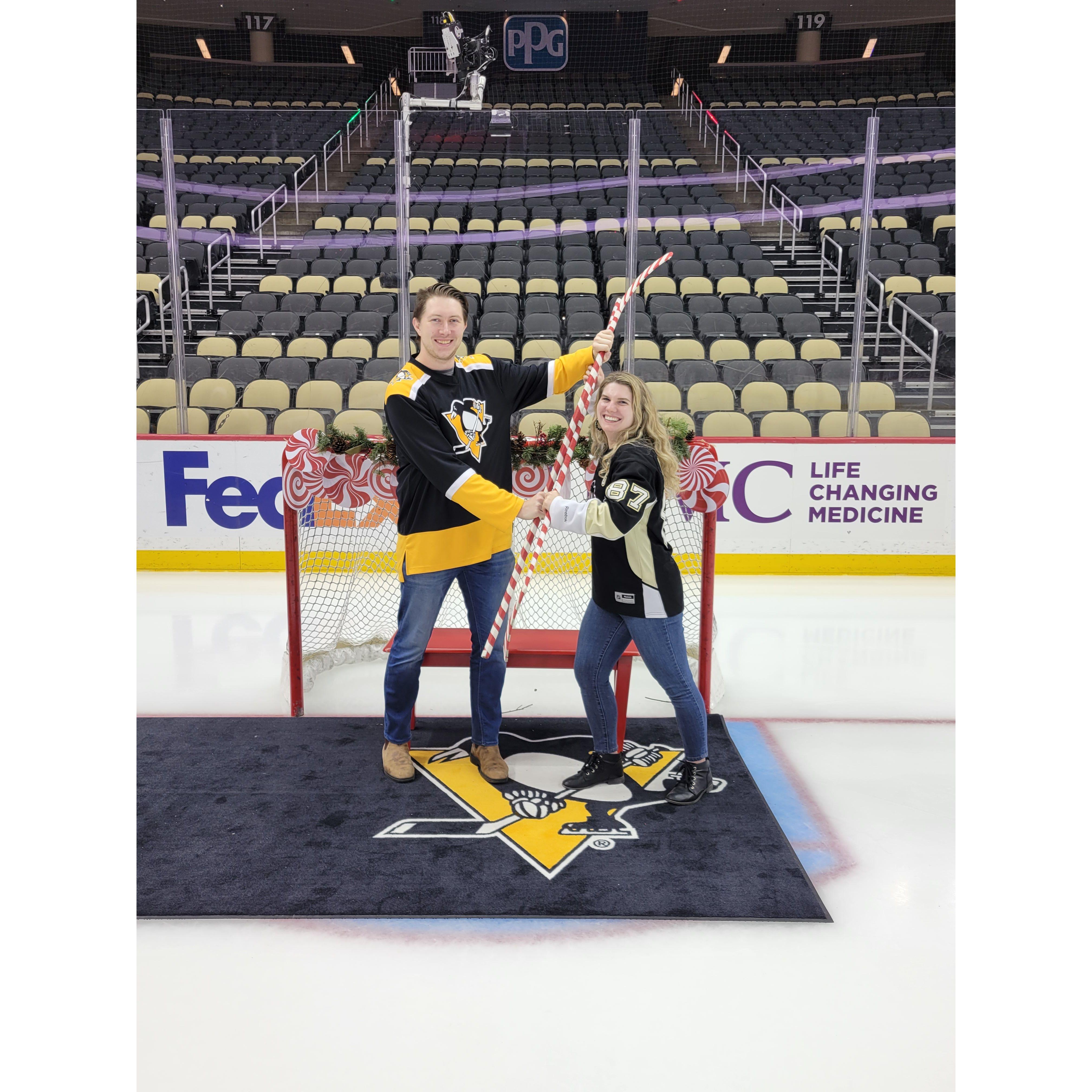 Jonah showing me how to check someone on the Penguins rink.