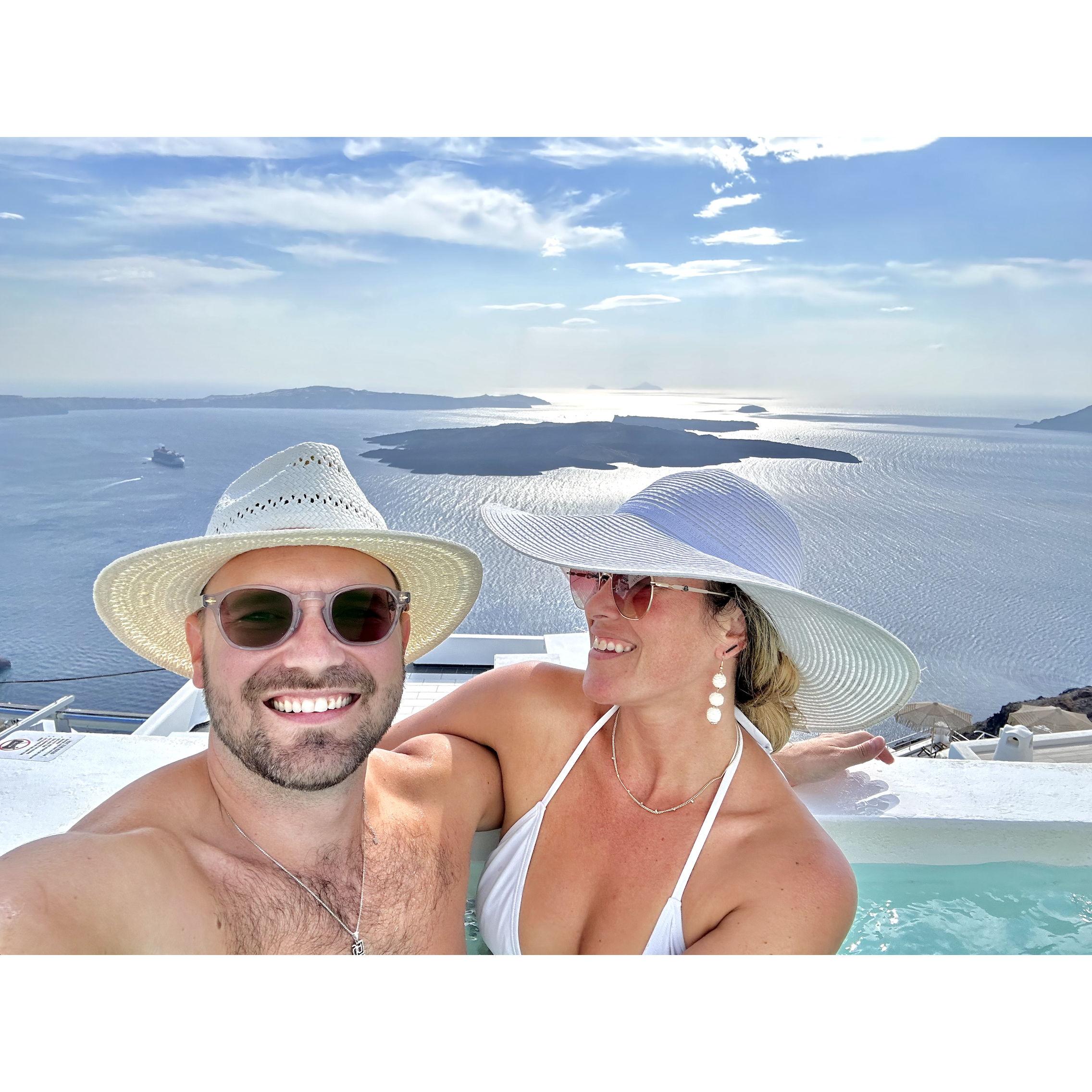 Enjoying our cliffside views in Santorini!