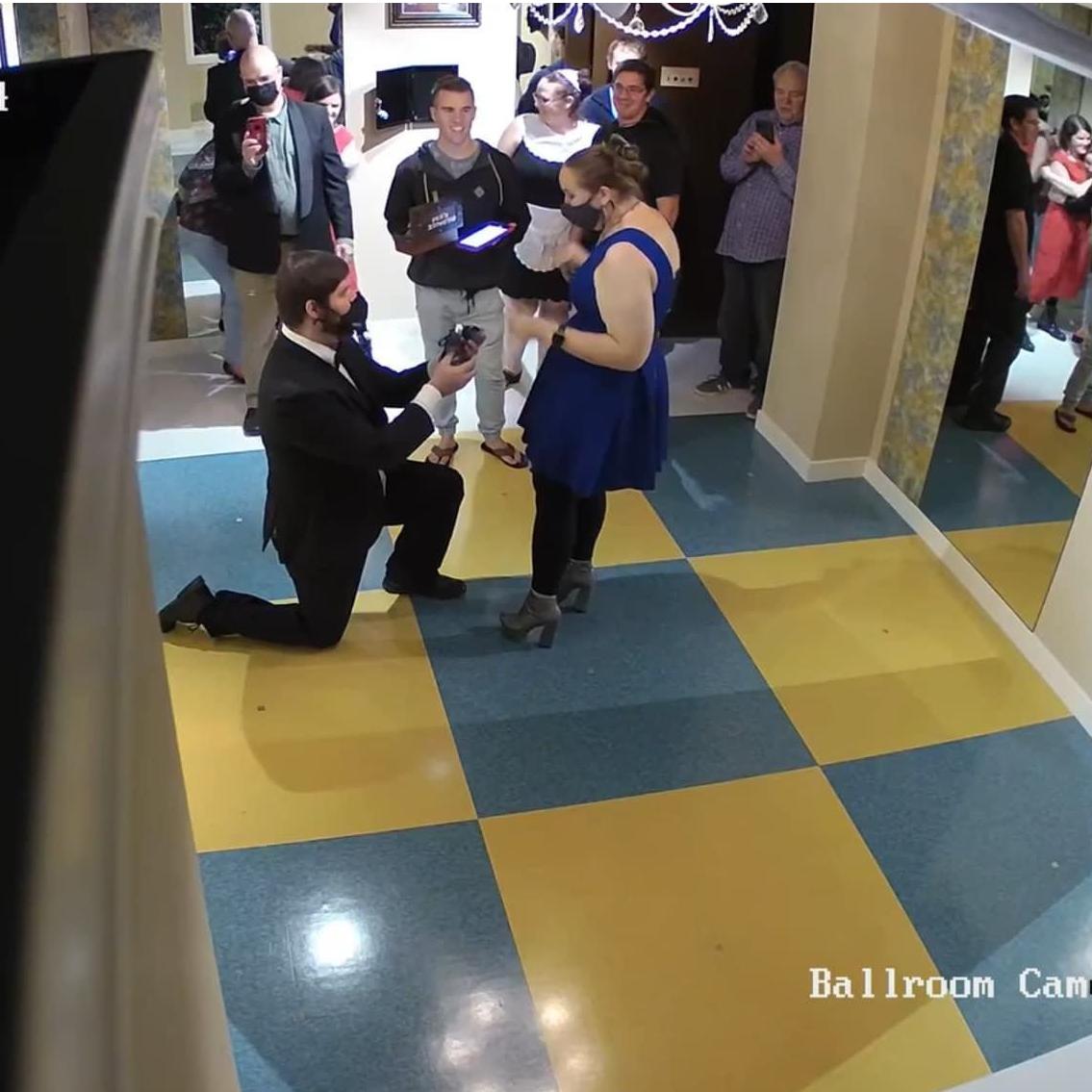 The proposal!!! This is the exact moment I realized what was happening. He did amazing and had the ring hidden in the last box we were trying to get open. It was all caught on the room's camera.