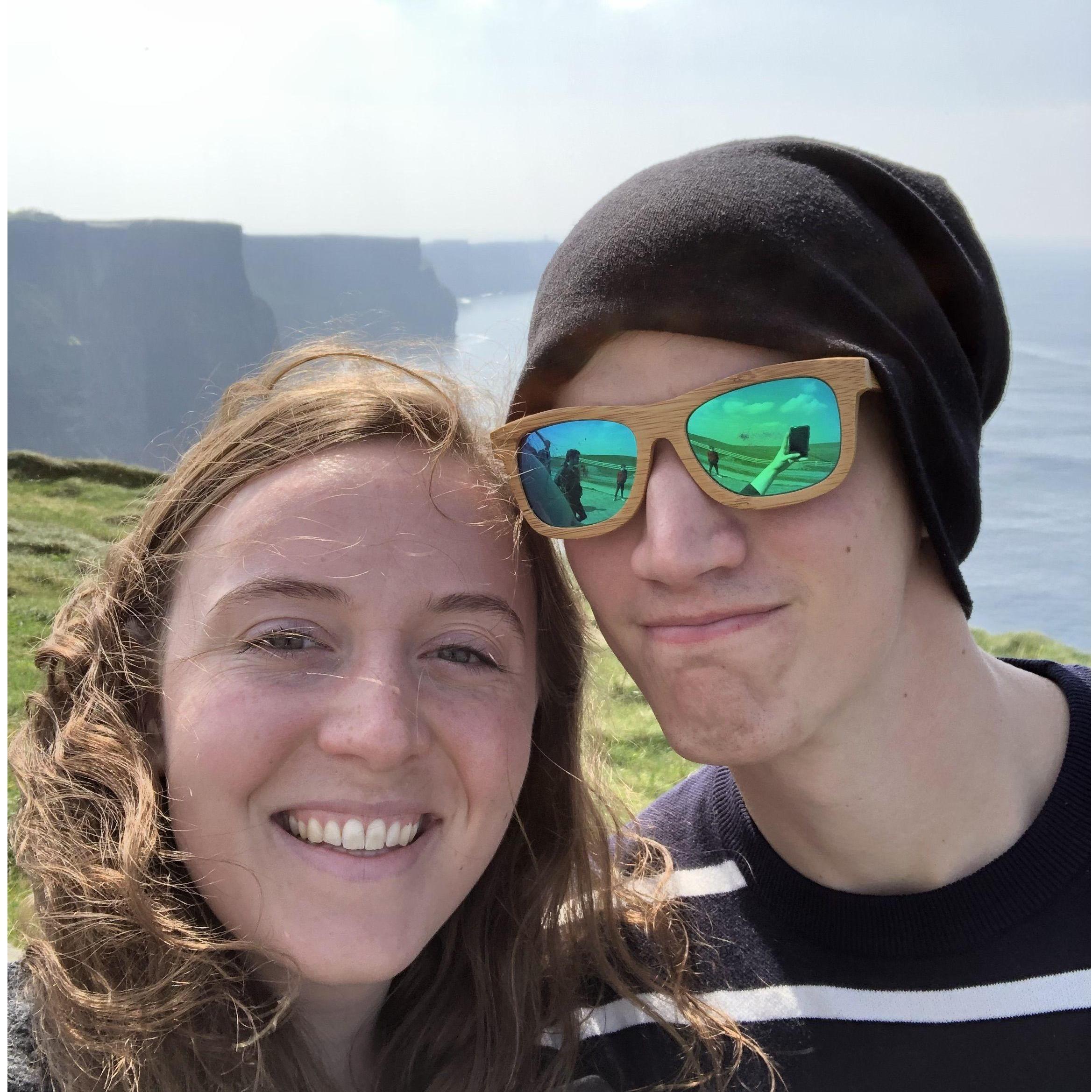 Visiting the Cliffs of Moher on our first trip together.