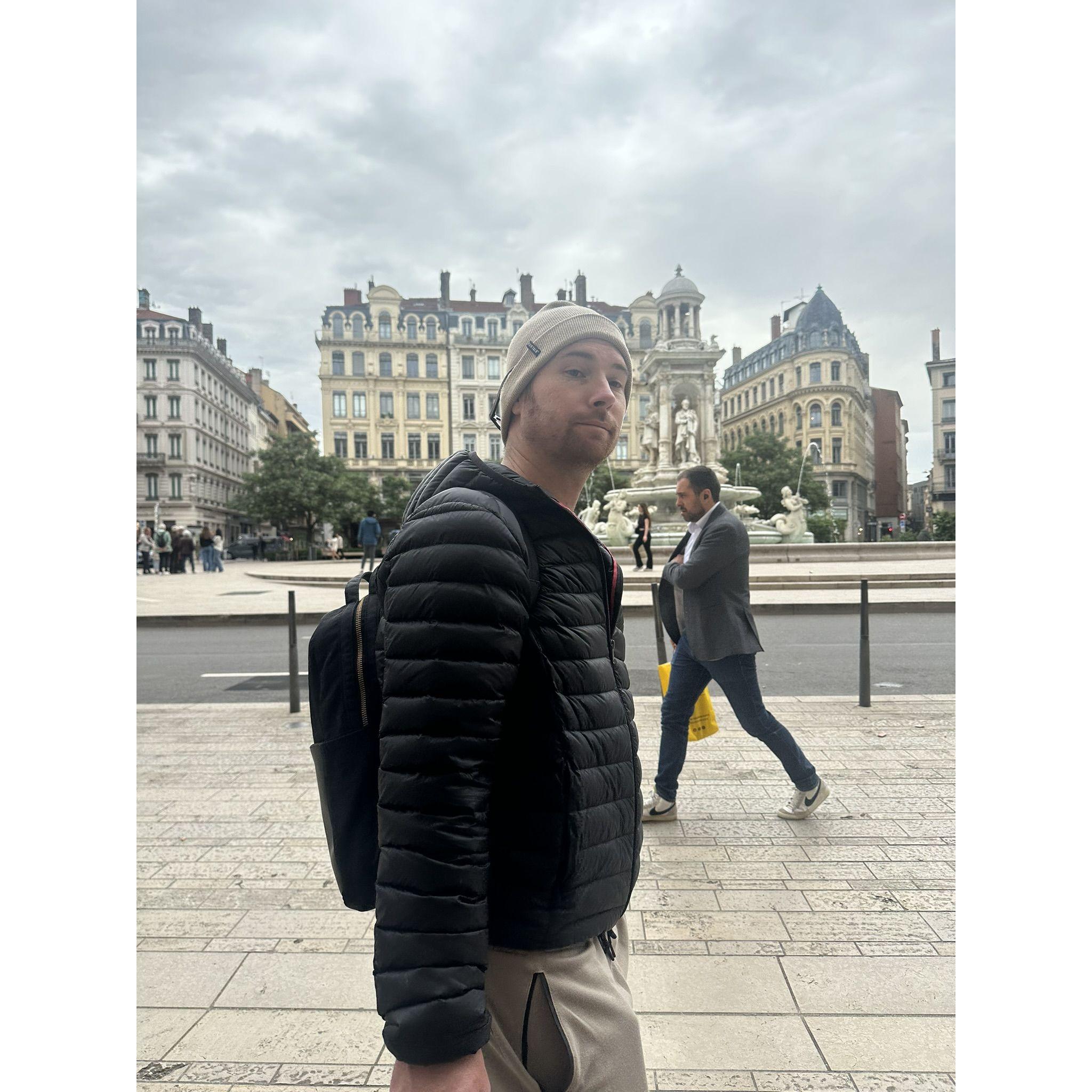 Derek in front of the Place de Jacobins in Lyon, Fr.