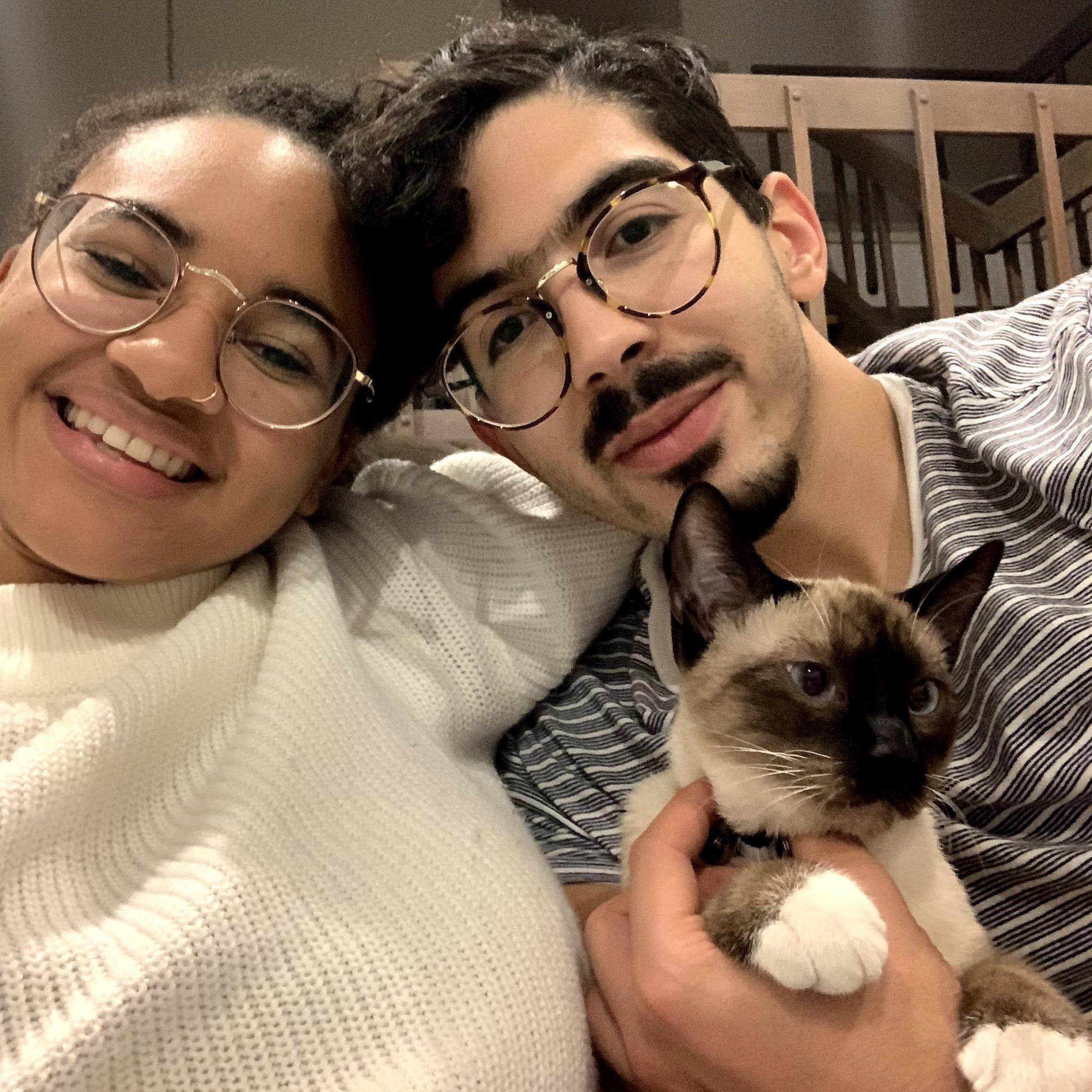Family photo with our first (but not last, he's getting a sister) adopted kitty boy, Milo