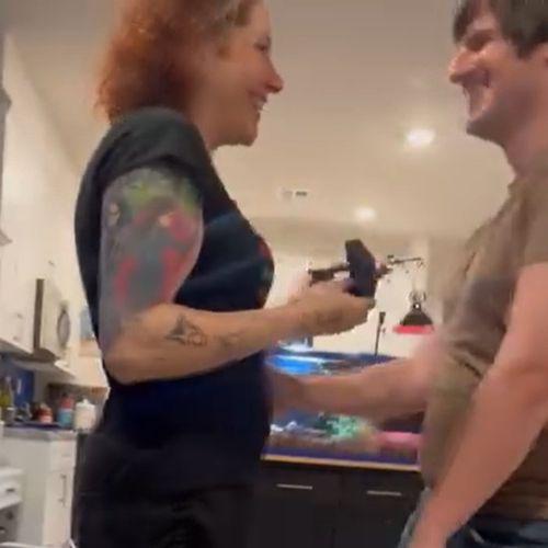 A blurry (but wonderful) screenshot captured from the video Joey took of Erik's proposal.
