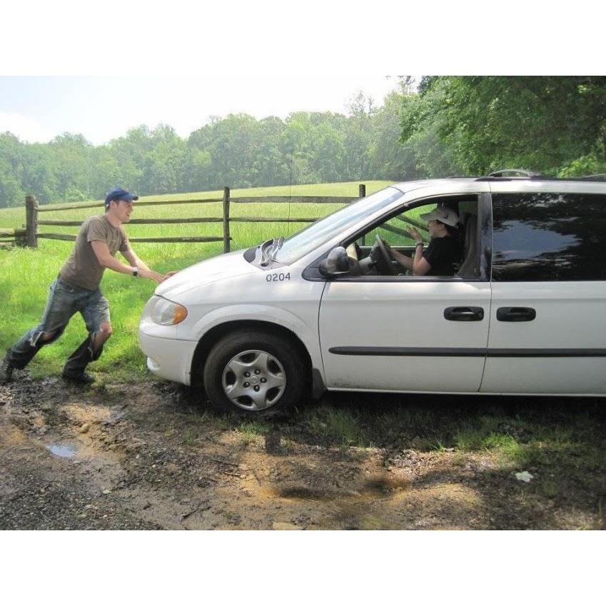 Just an average day of field work, getting Villanova vans stuck in mud