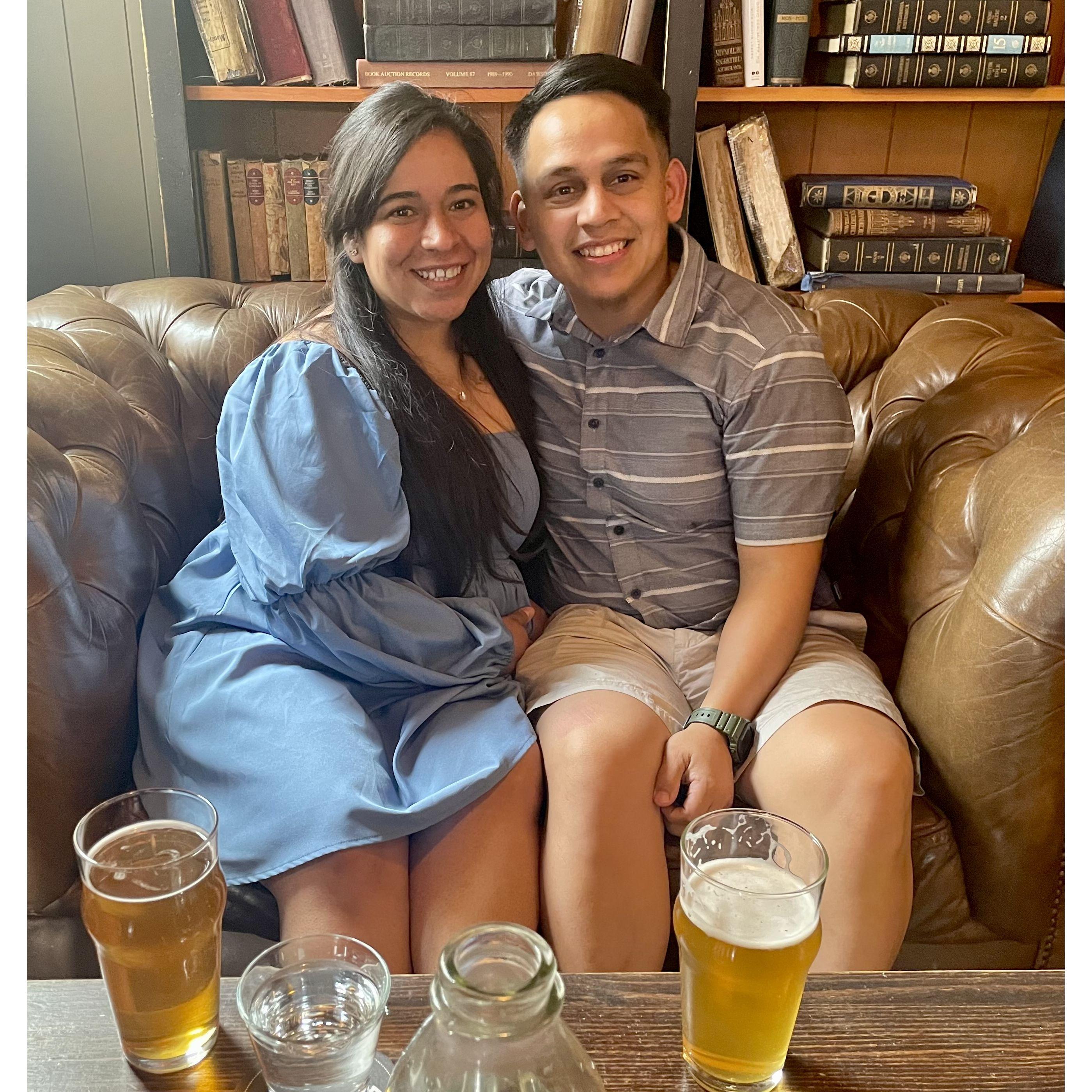 Enjoying a beer and couple quizzes at Half Door Brewing Co. before the proposal.