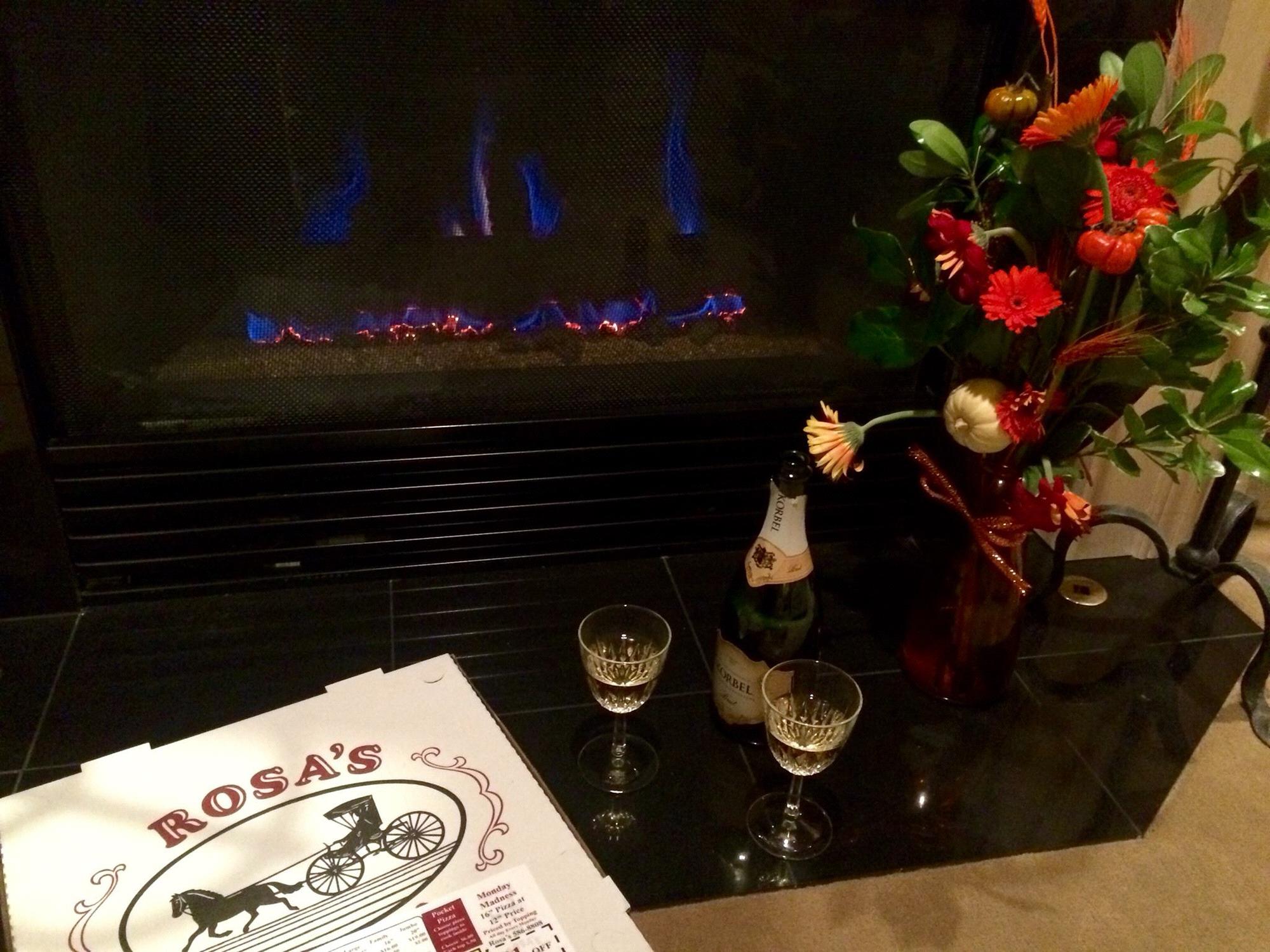 Our very first night in our new home! Pizza, Champagne, & Flowers!