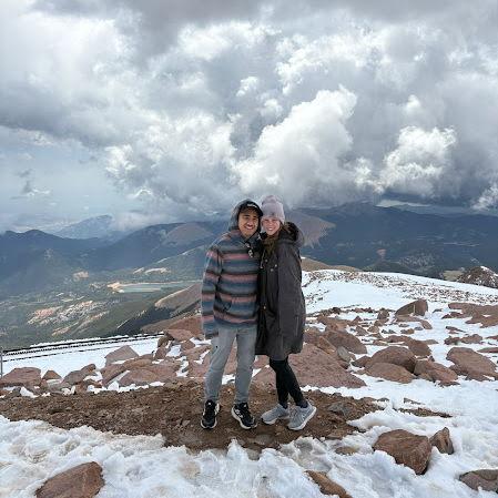 He set it up by telling me we he wanted to take some good pictures with the view before sneaking around me onto one knee.