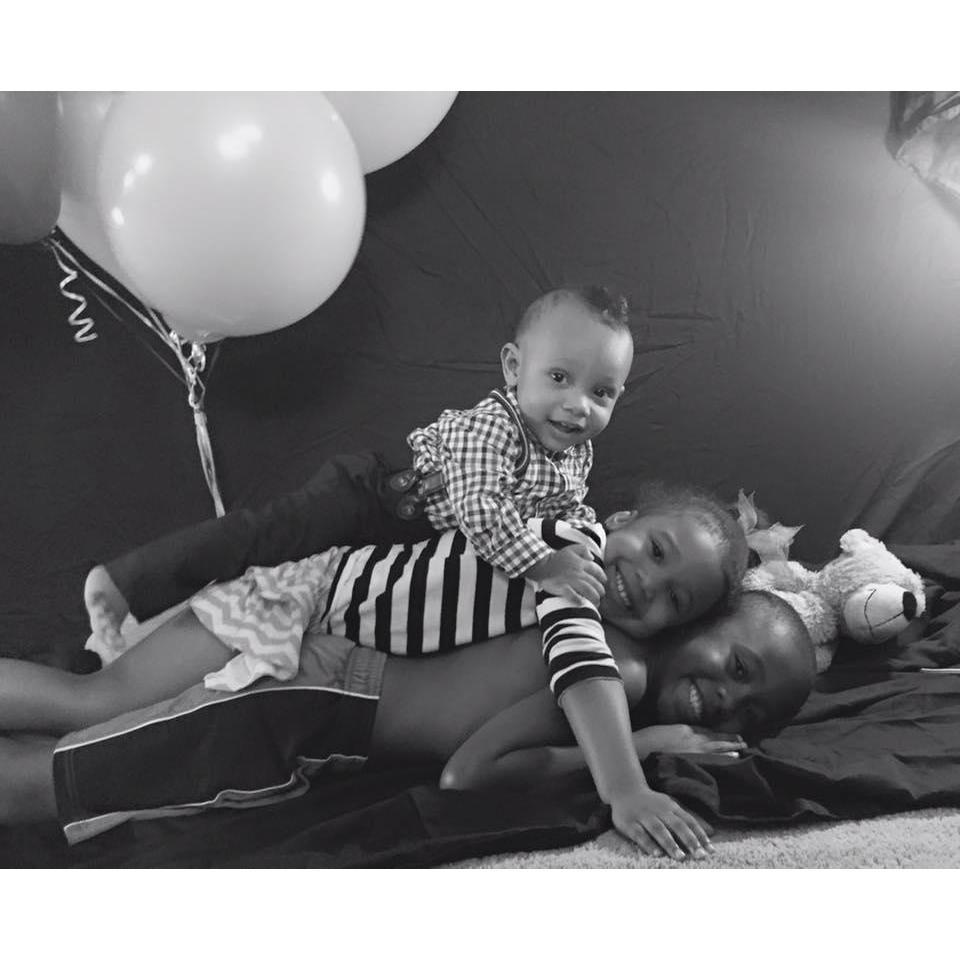Elijah's 1st birthday photo shoot. His sister and brother just had to join in.