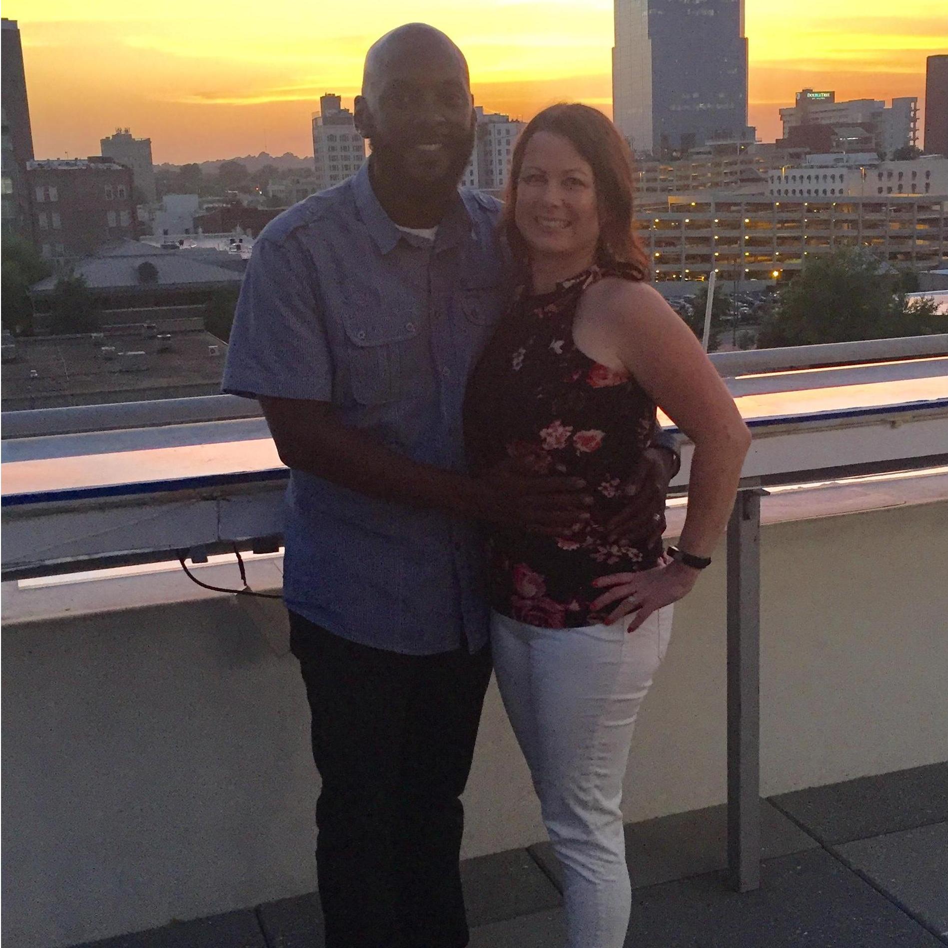 Romantic dinner on rooftop downtown.