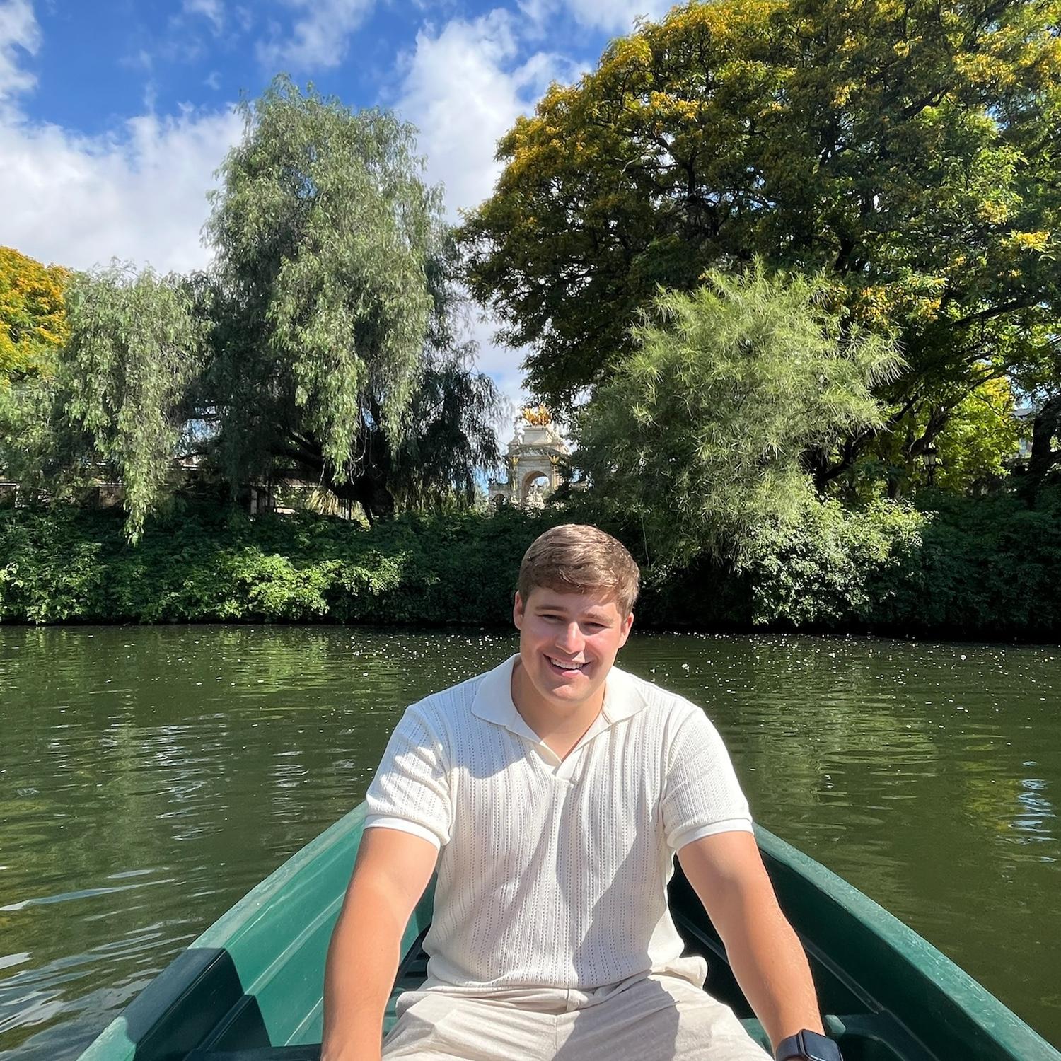 Lucas rowing me around on the rowboat right after our engagement photos.