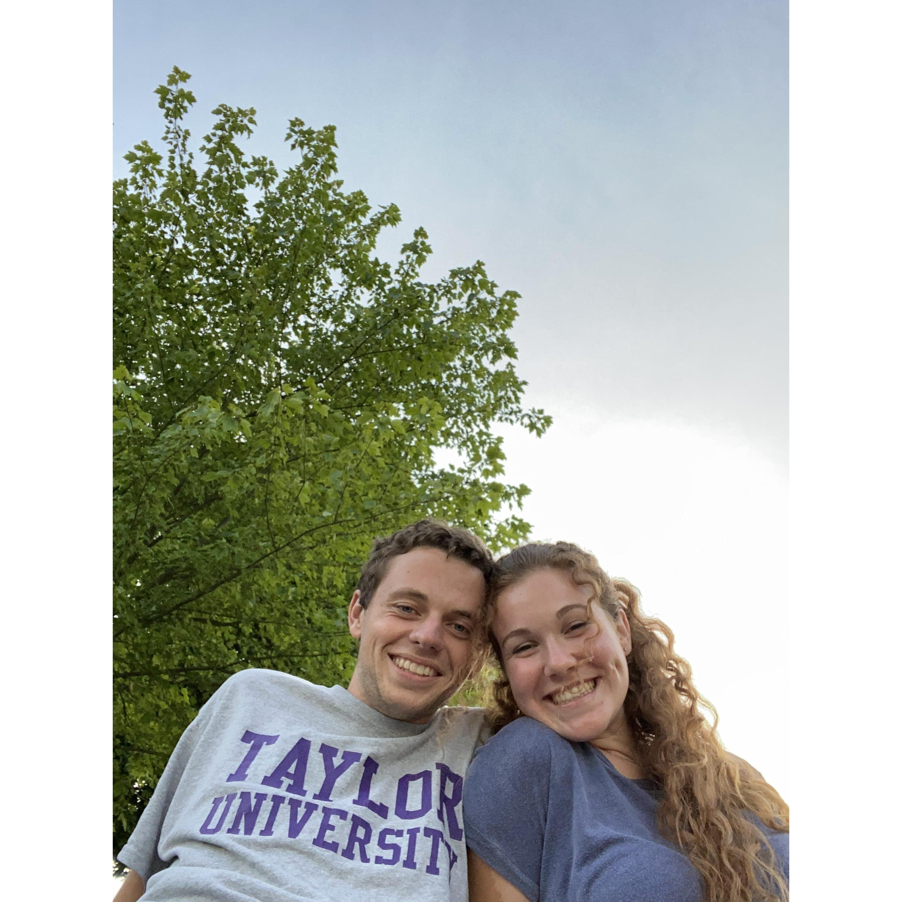 julia and parker happily come back together after 100 days of covid long distance.. we celebrated with sandwiches and soccer at the park