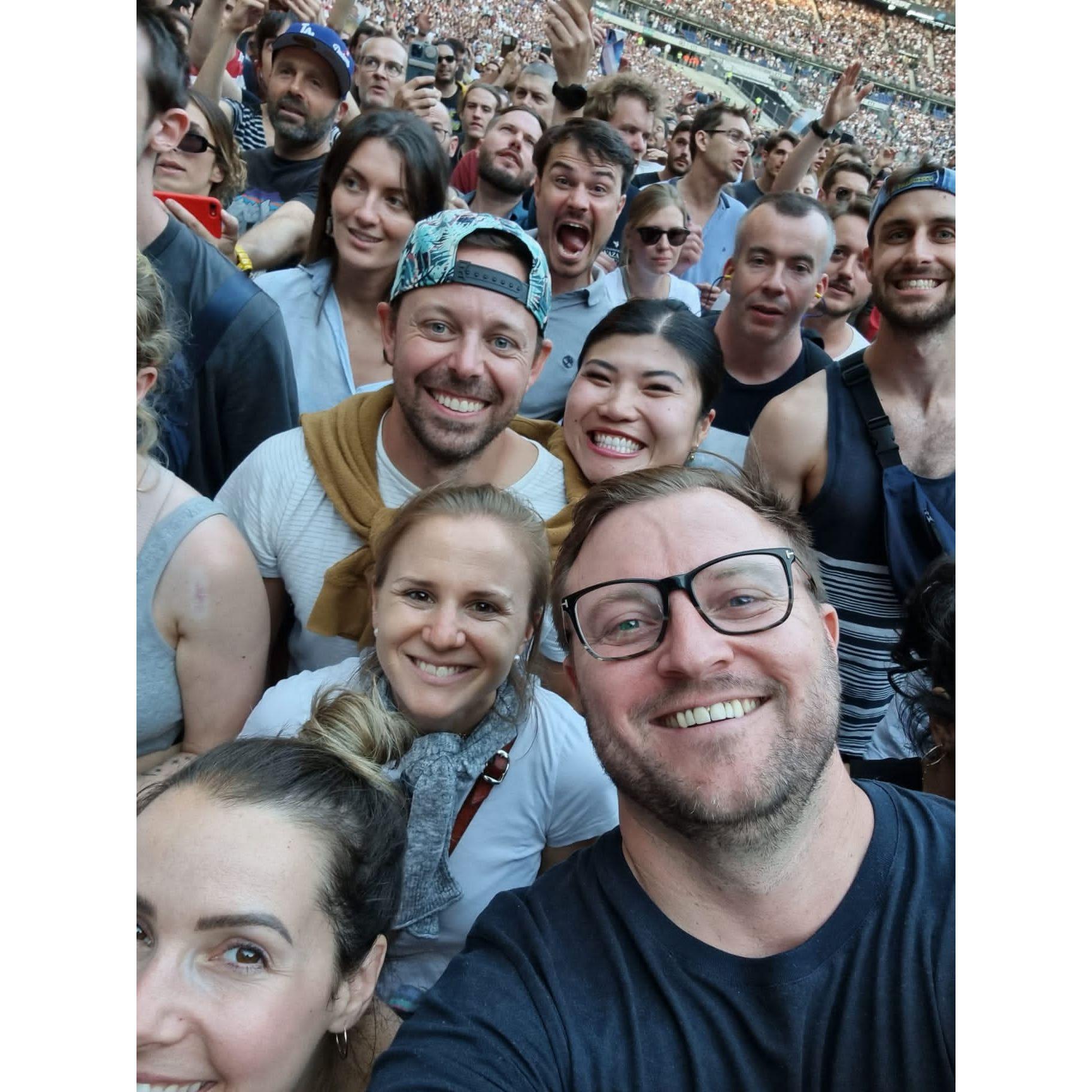 Red Hot Chili Peppers in Paris! Clearly an excited photo bomber in the back