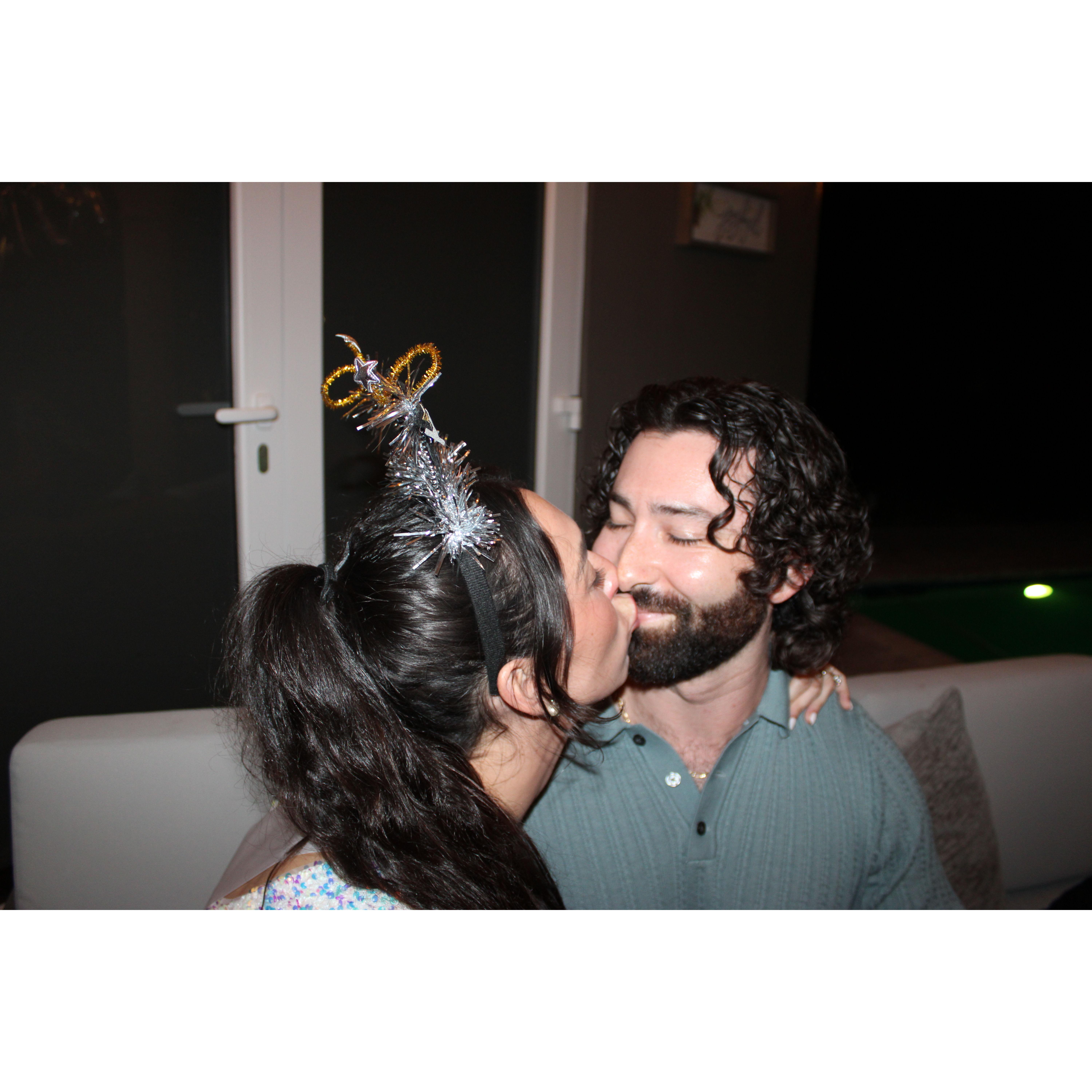 Cheeky smooch on NYE 12.2024