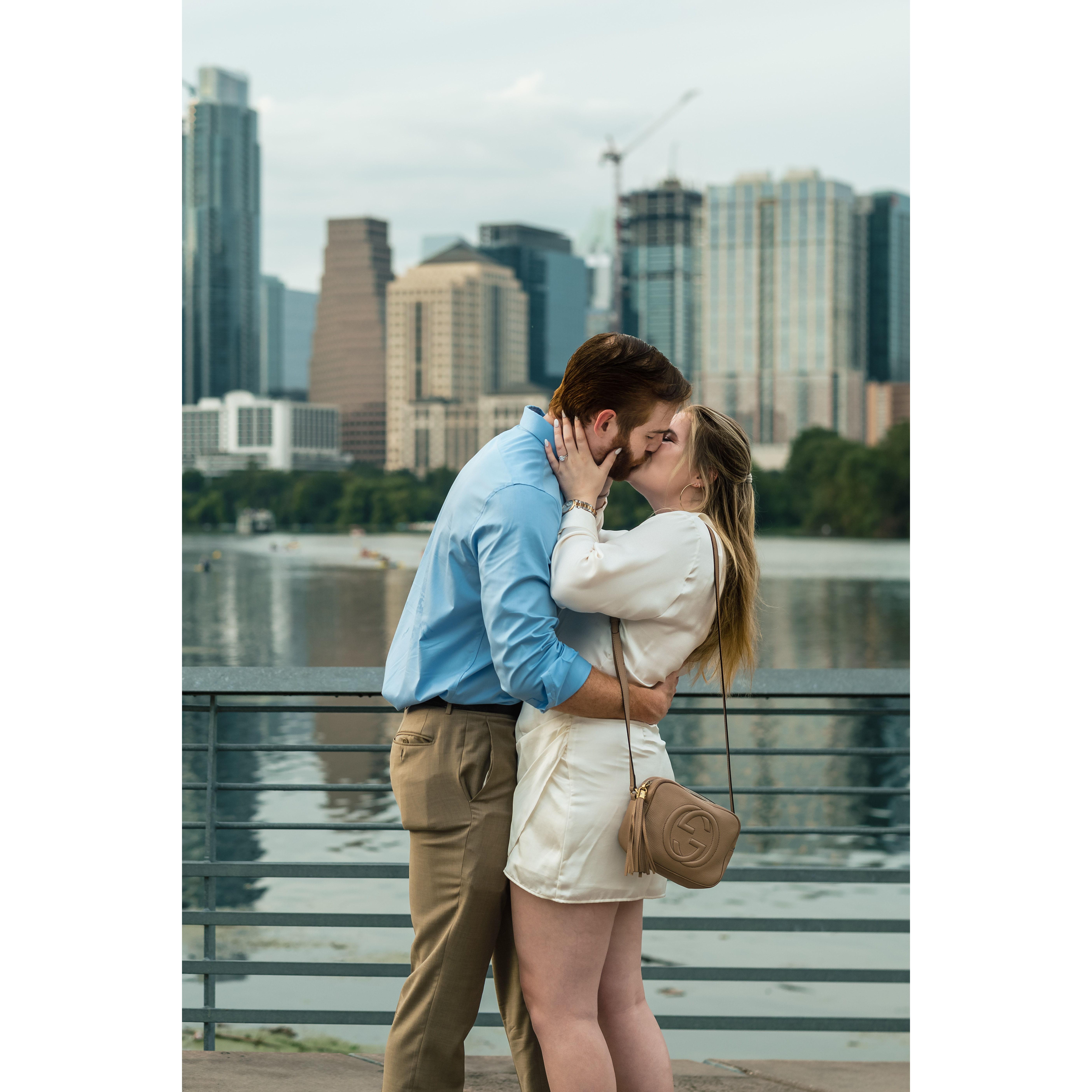 Parker proposed to Allie on the river walk over looking the Austin skyline.