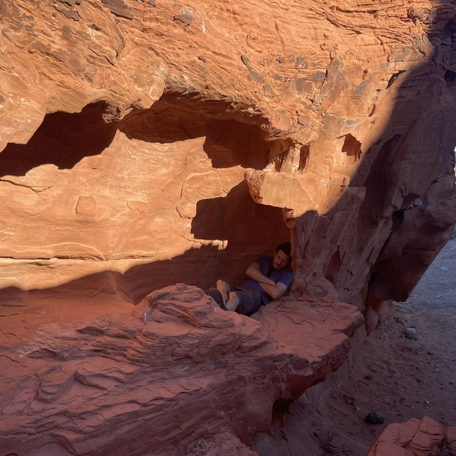 Oscar pretending to take a nap at Valley of Fire State Park!