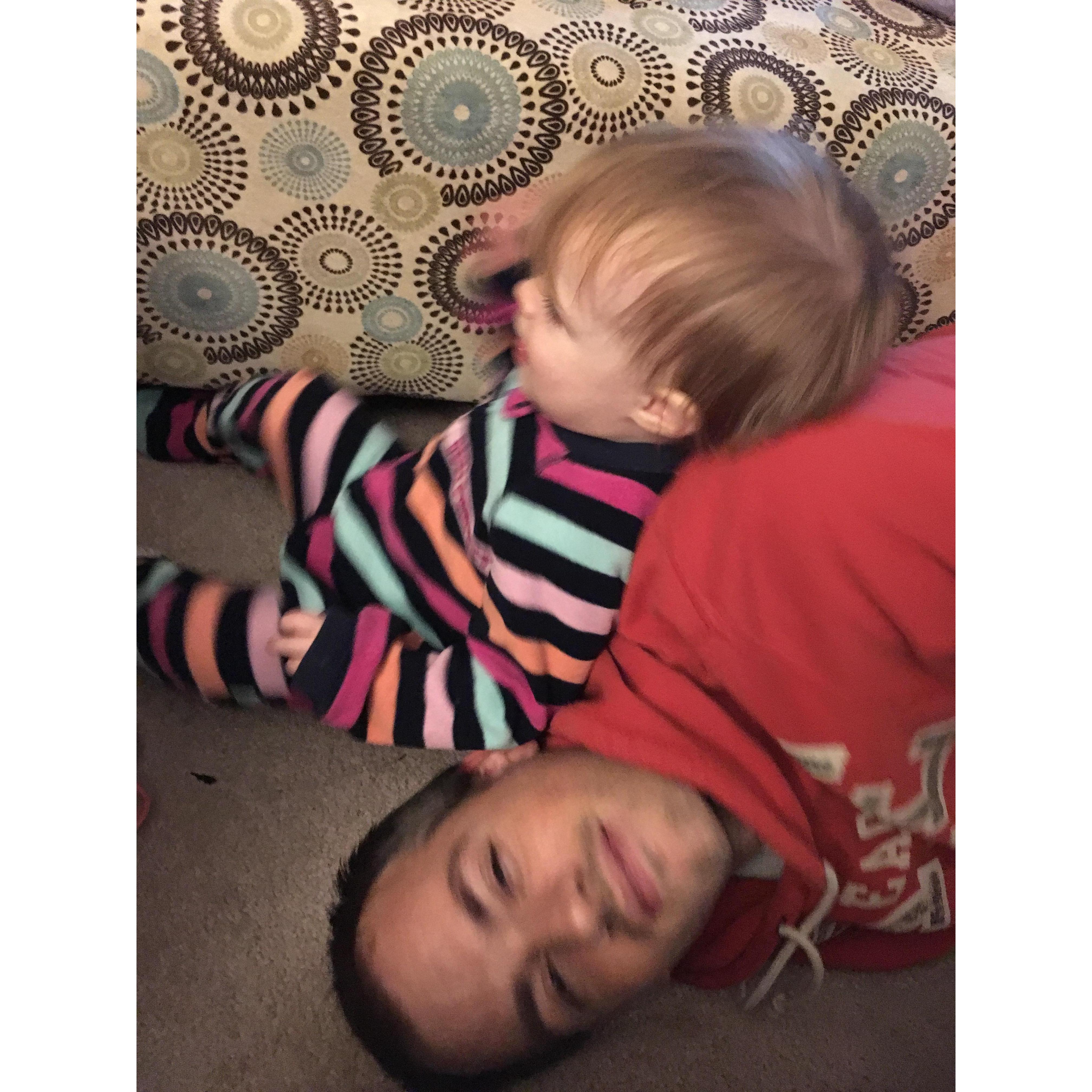 A peek into one of our funniest Sadie moments. "Help Daddy, block under there!"
...Daddy lays on floor to find block, Sadie sits on Daddy's head...
I think Cory's face says it all. hahaha!!!