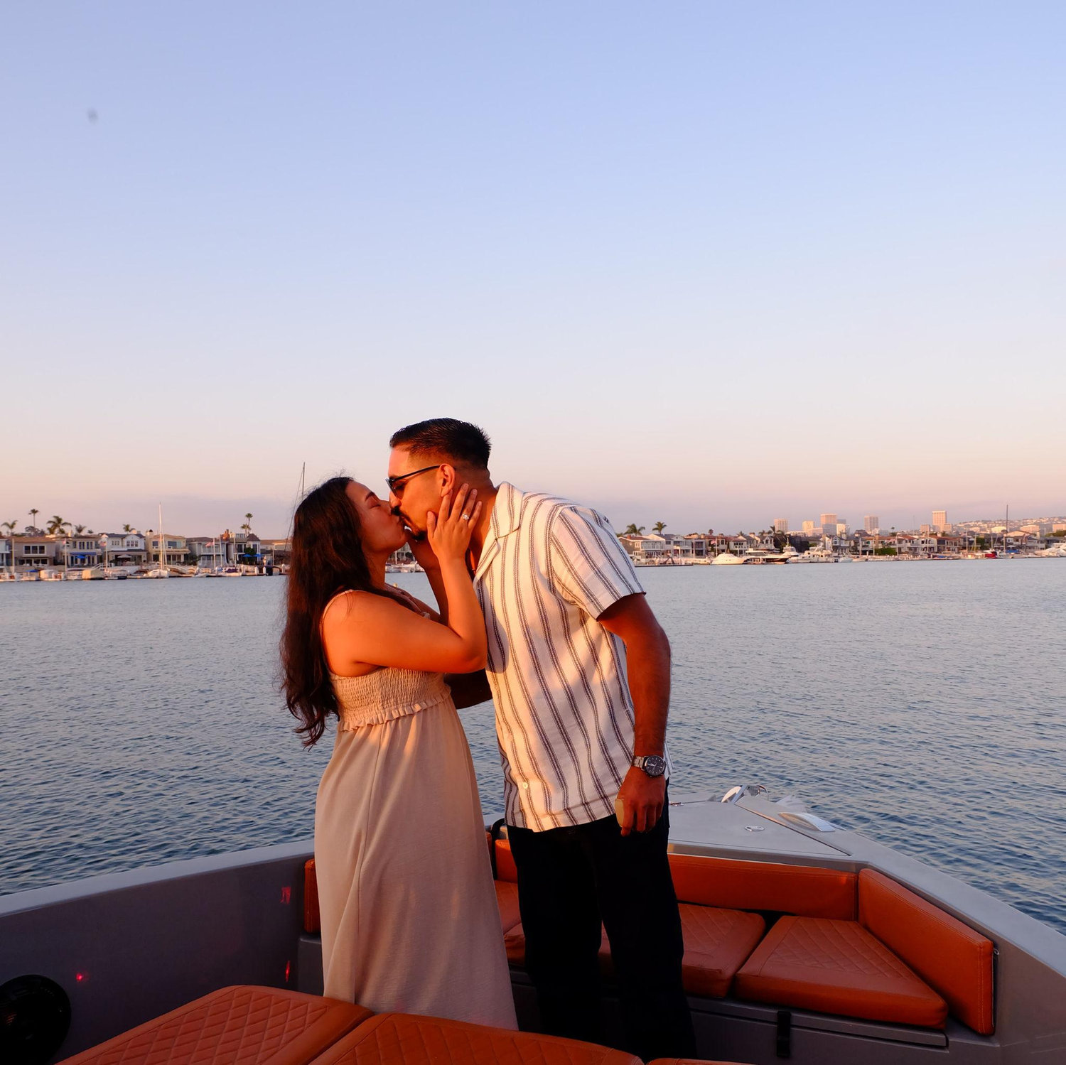 Their first kiss as fiancés, marking the beginning of their forever.