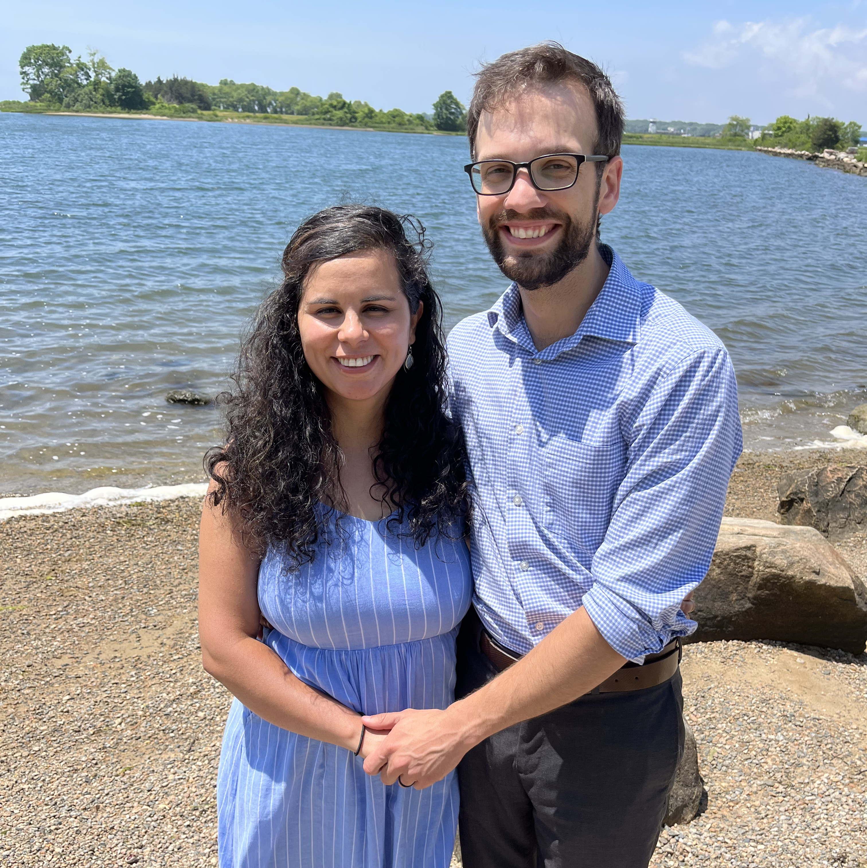 We got married (eloped) on the beach at Bluff Point State Park in Groton, CT. Ernest Adams, a justice of peace, officiated our wedding. The two of us celebrated by having a picnic on the water.