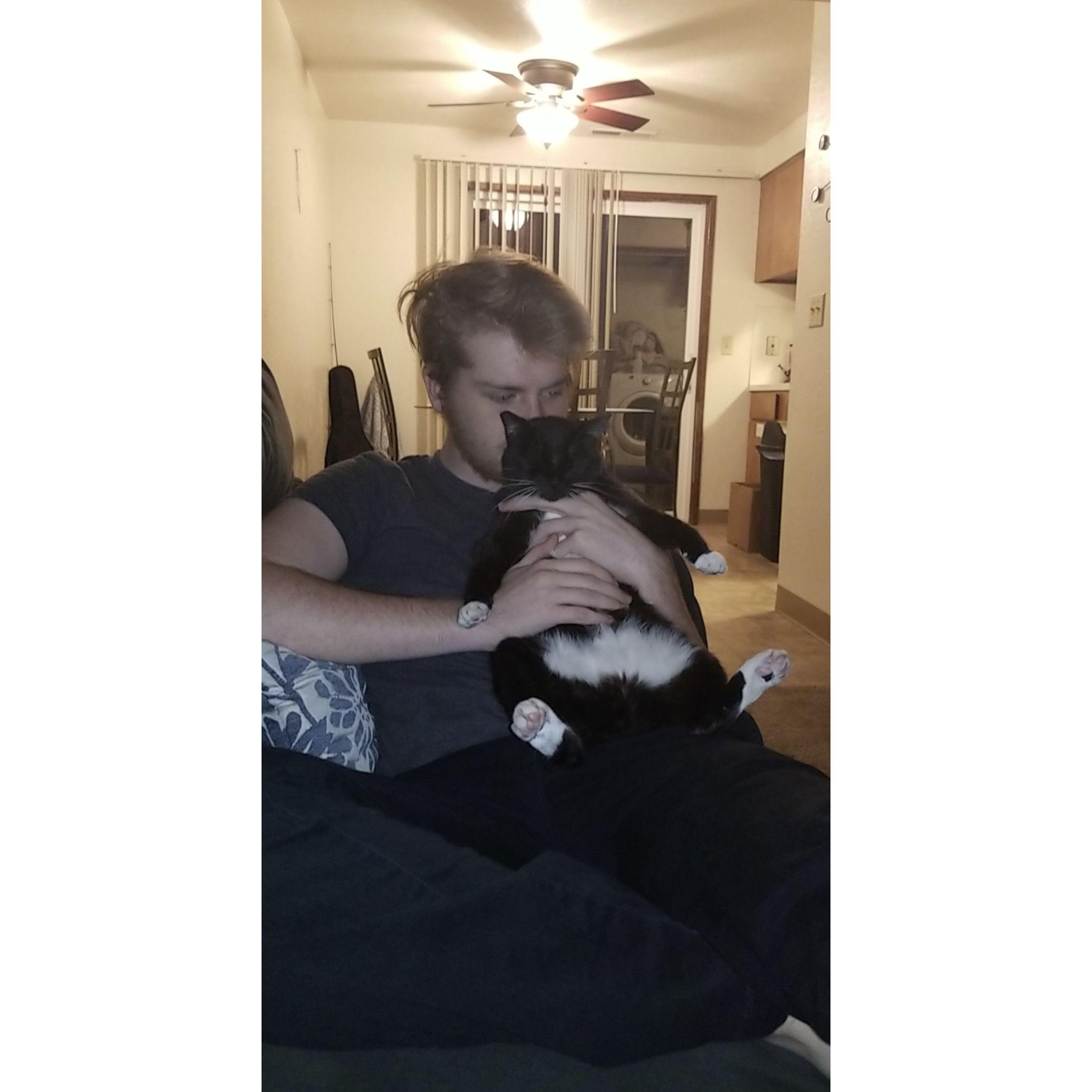 In 2019, a few months after the lovely couple moved in together, Ethan's love of cats prompted them both to adopt Boots, who is now 9 years old.