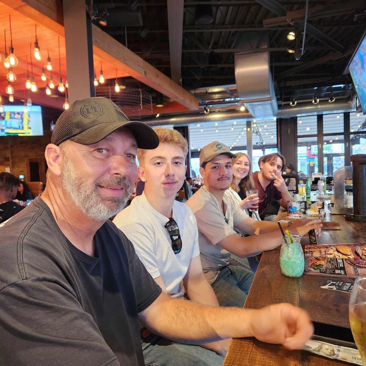 Having a drink in Canada with Miranda’s immediate family— their second trip abroad, and certainly not their last!