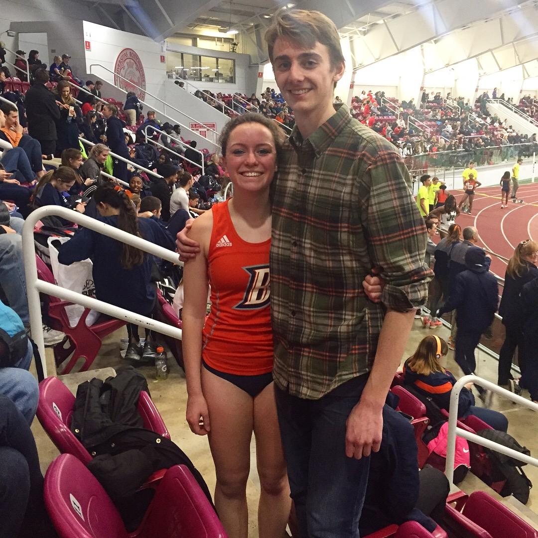 Peter cheering Emma on at college meet at BU... before we knew we would someday be living together a mile away from this track.