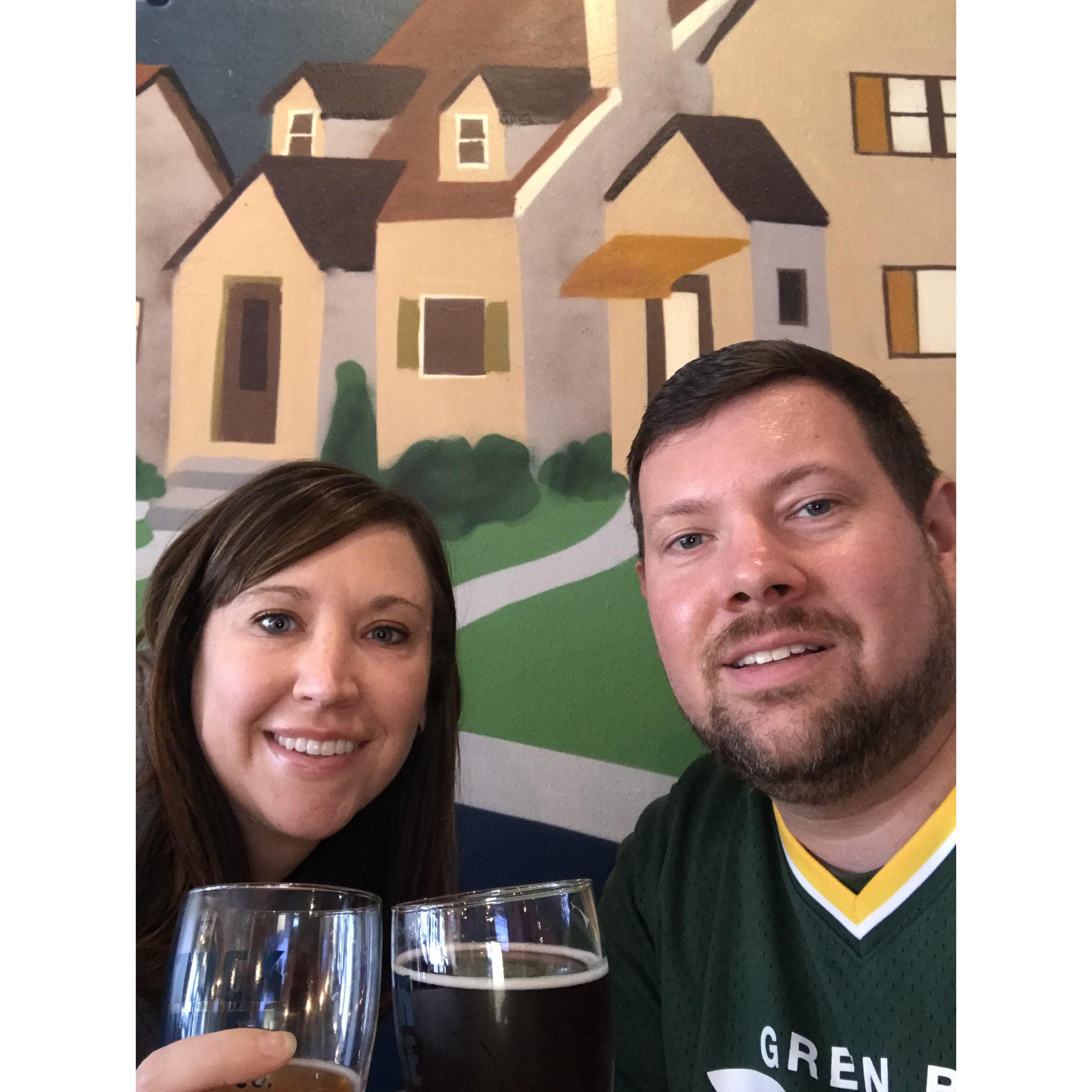 Having a toast at one of our favorite neighborhood spots, Stock House Brewery! Go Pack! (Lauren rolls eyes)