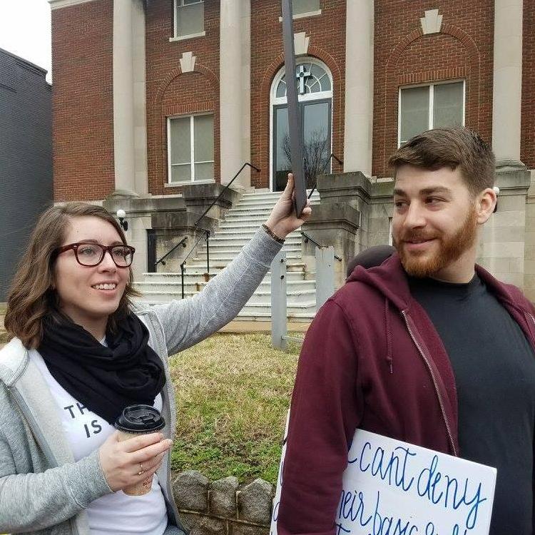 The couple who protests together stays together (and has similar values and pauses the news to debate at length).