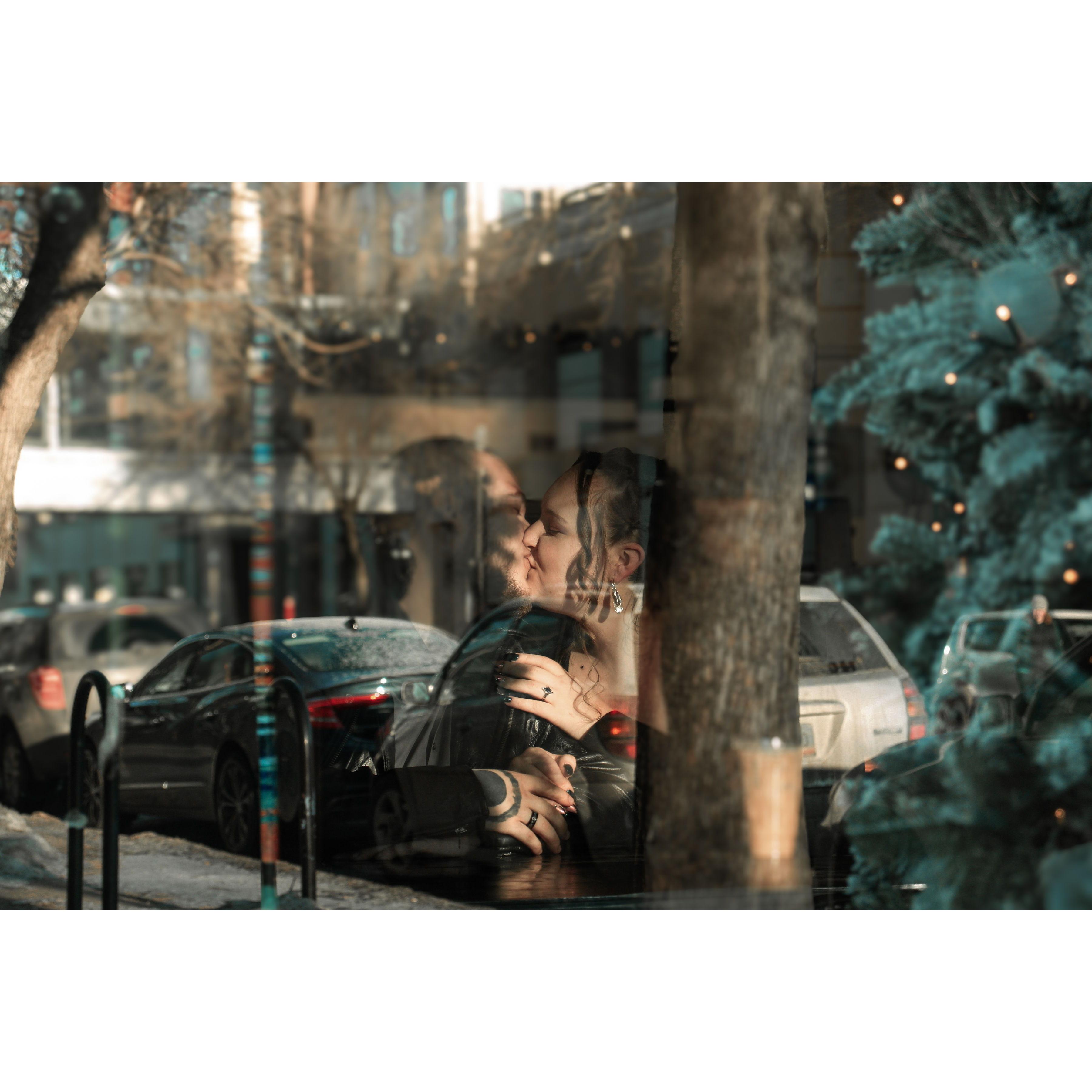 Taken from outside the window at our favorite coffee spot (Engagement shoot)